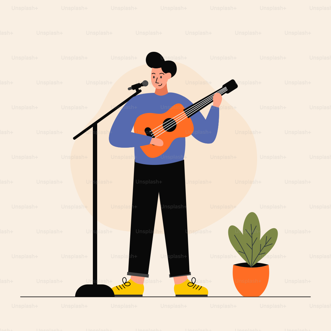 A man standing in front of a microphone holding a guitar