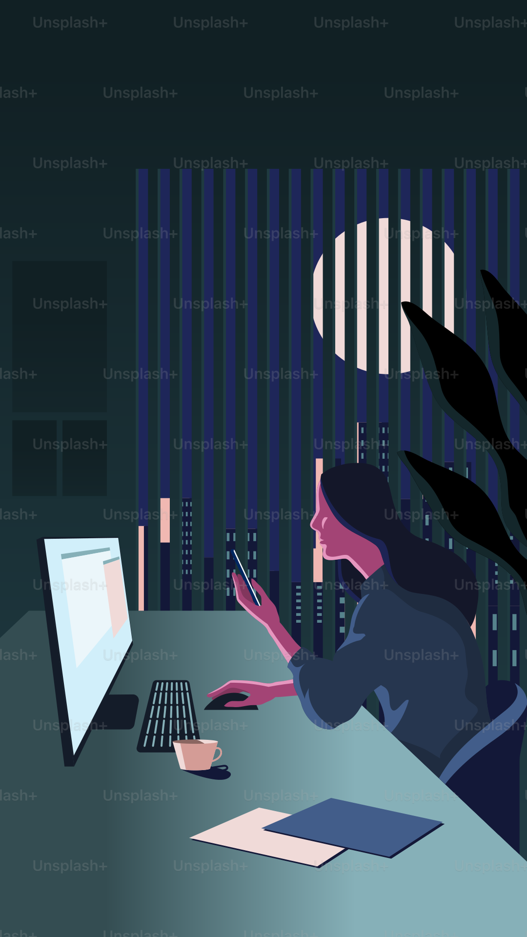 A woman sitting at a desk in front of a computer