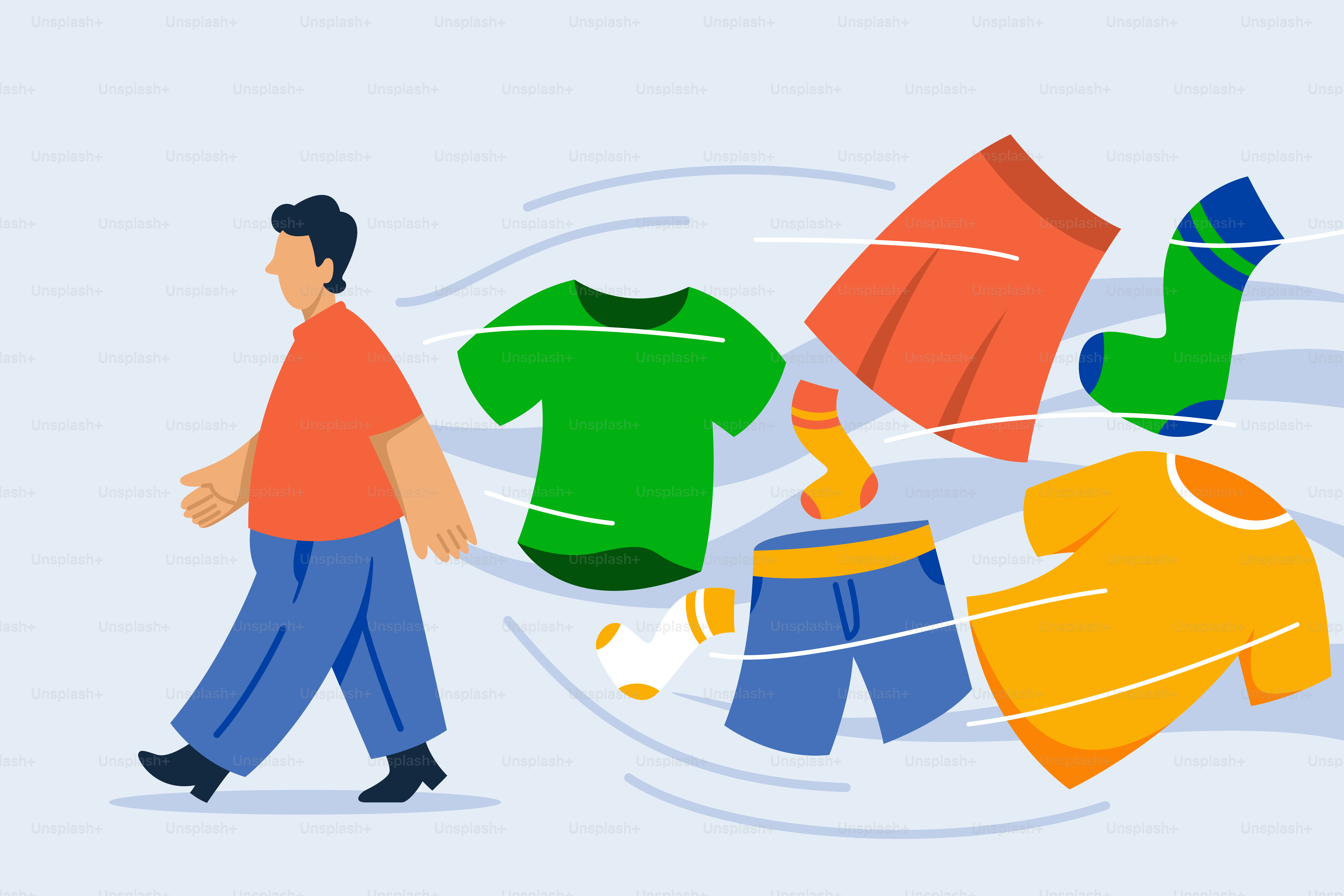 A man walking next to a pile of clothes