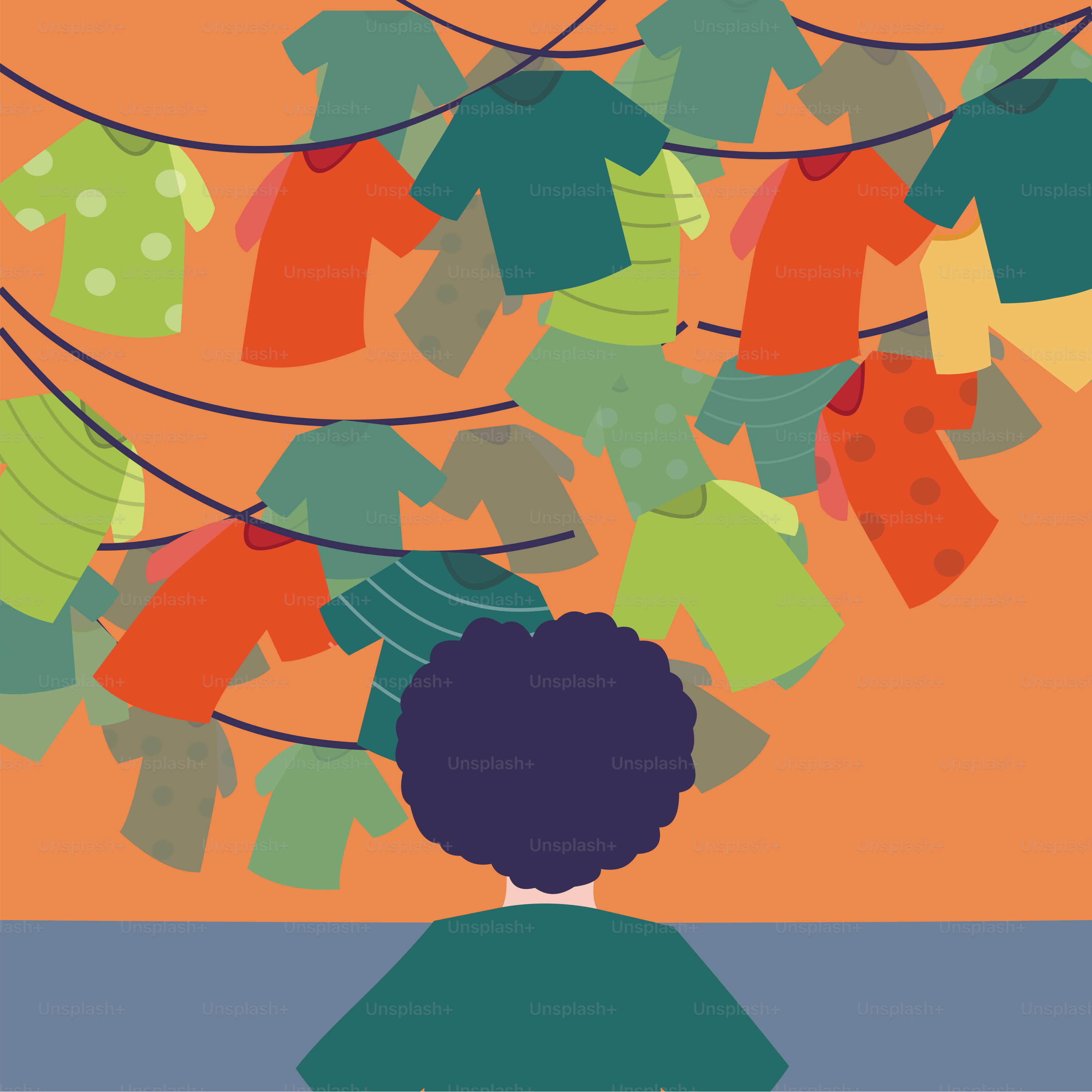 A person standing in front of a tree with clothes hanging from it