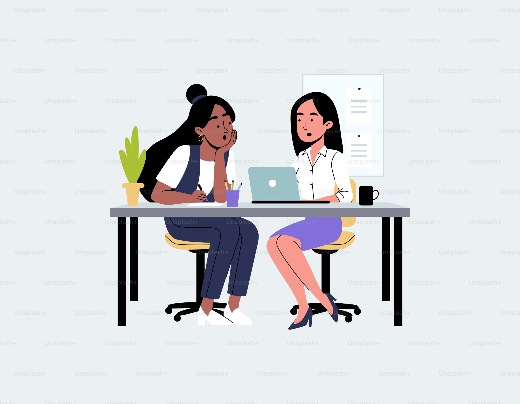 Dos mujeres sentadas en una mesa con un portátil