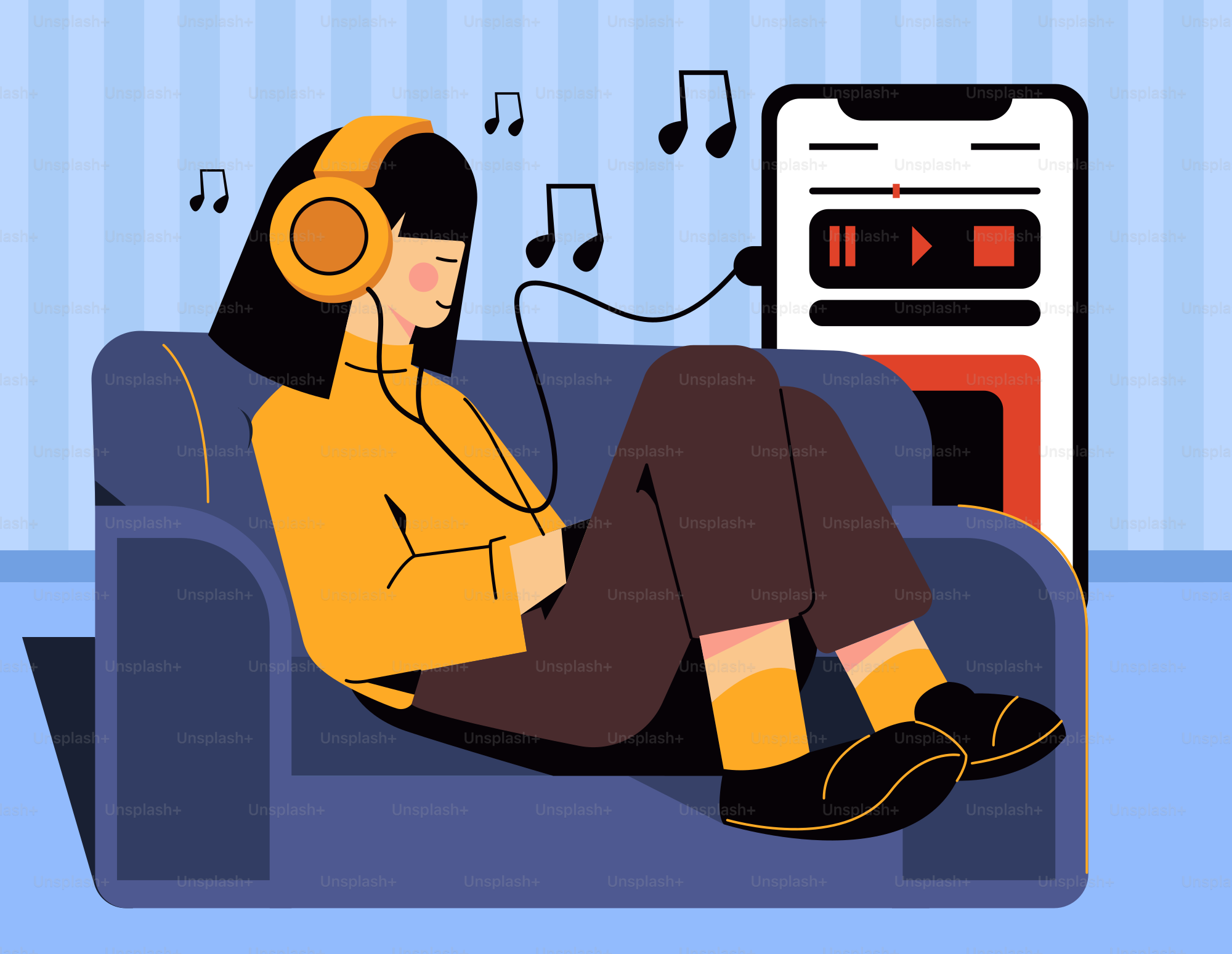 Una mujer sentada en un sofá escuchando música
