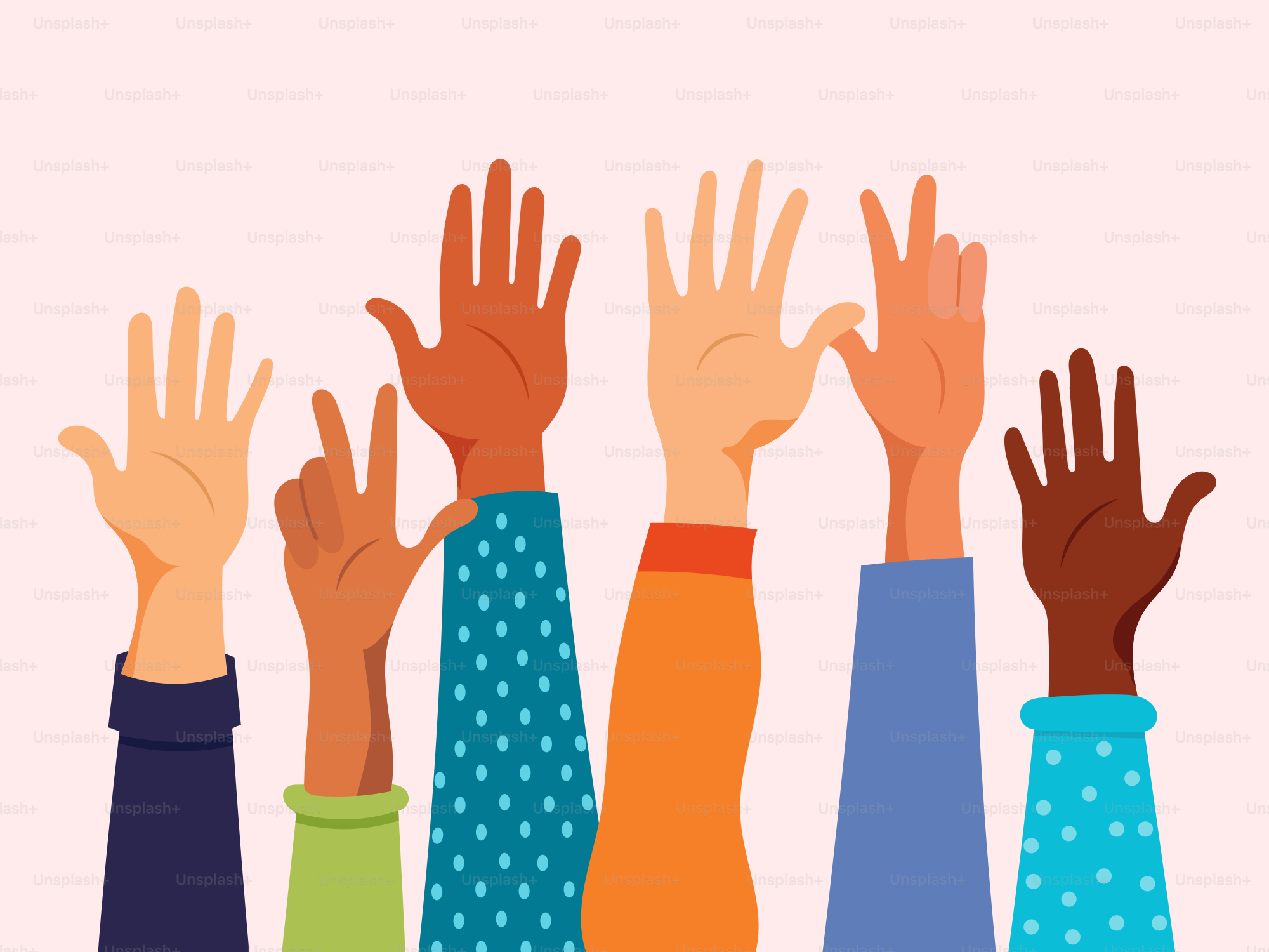 A group of people raising their hands in the air