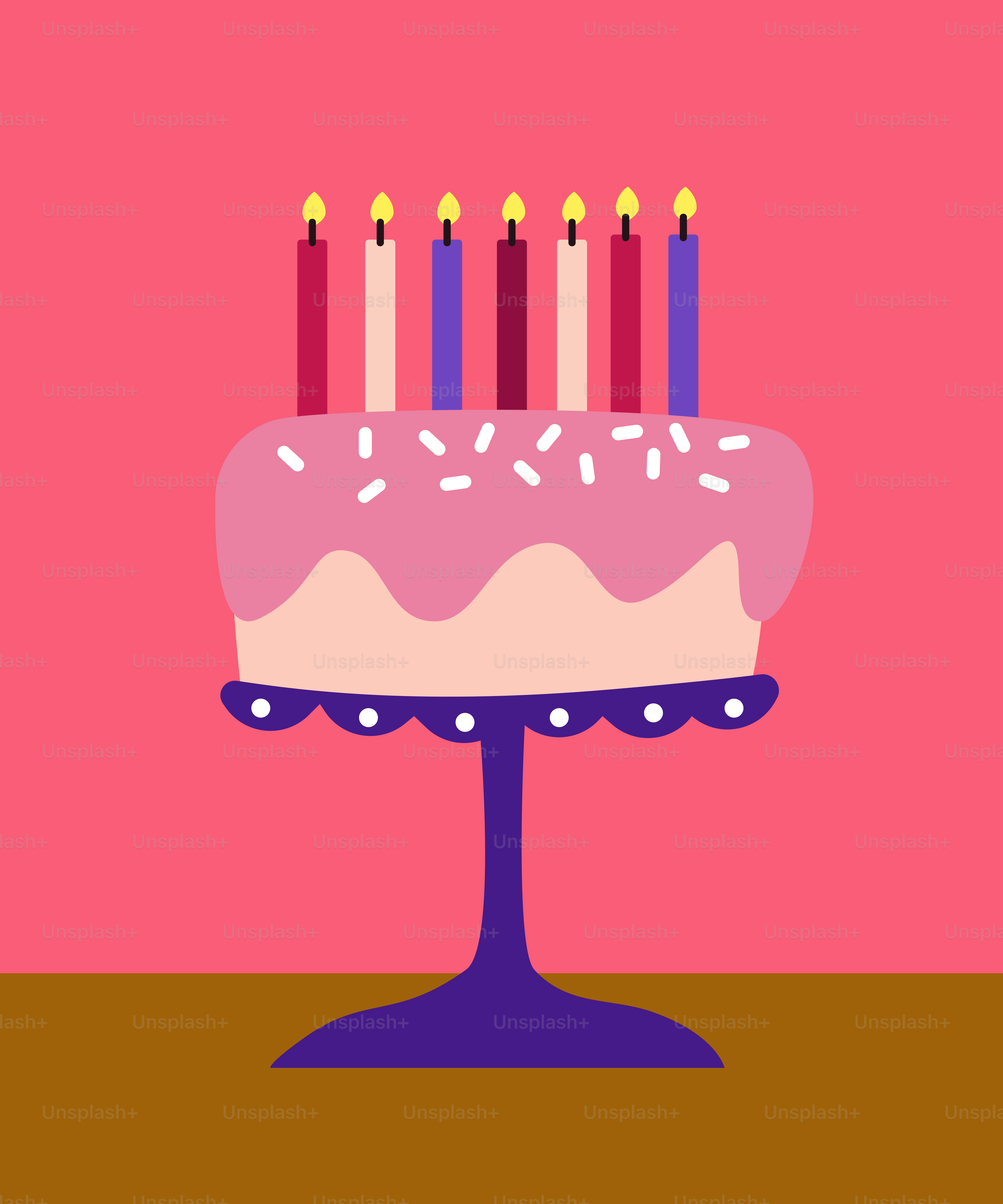 Kue ulang tahun dengan lilin di atas meja