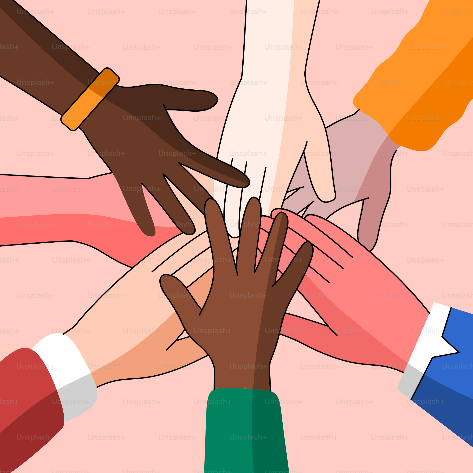 A group of people putting their hands together