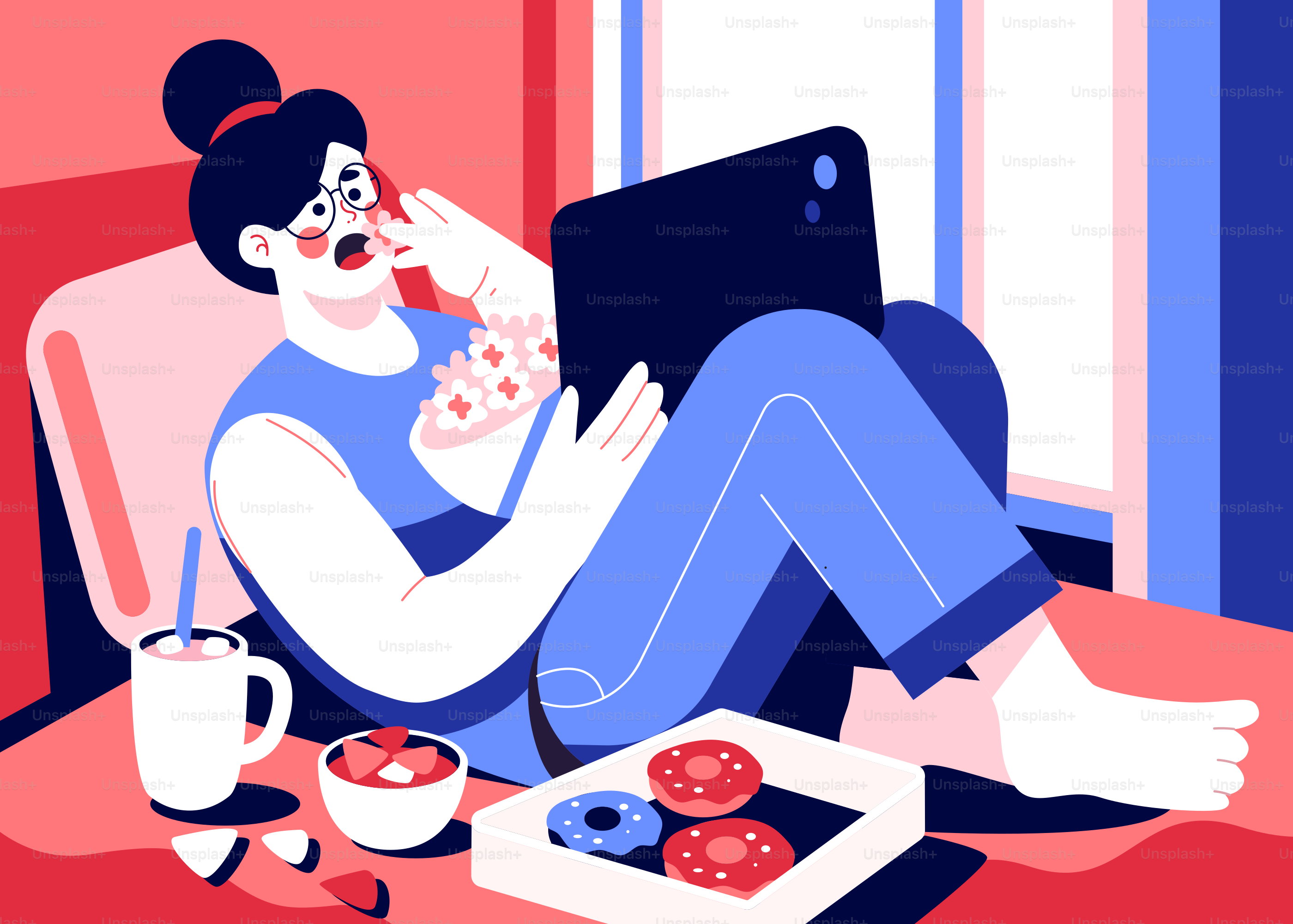 A person sitting on a couch with a laptop and a box of donuts