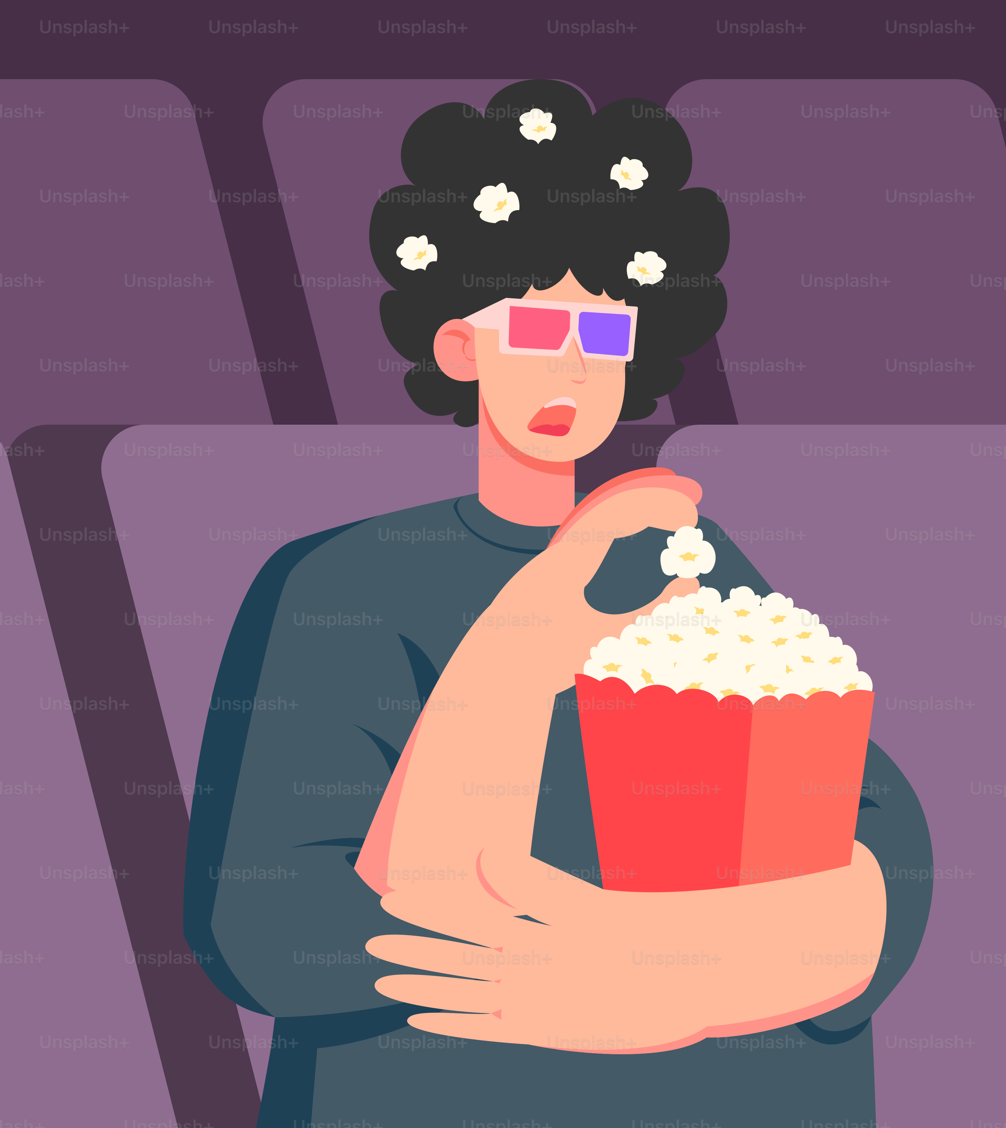Una persona con un secchio di popcorn in mano