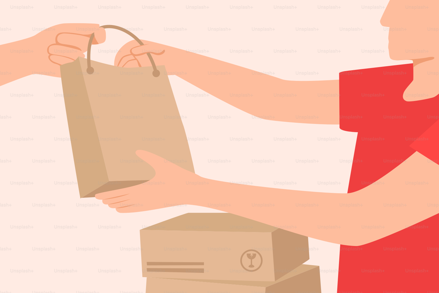 A man holding a brown paper bag over a cardboard box