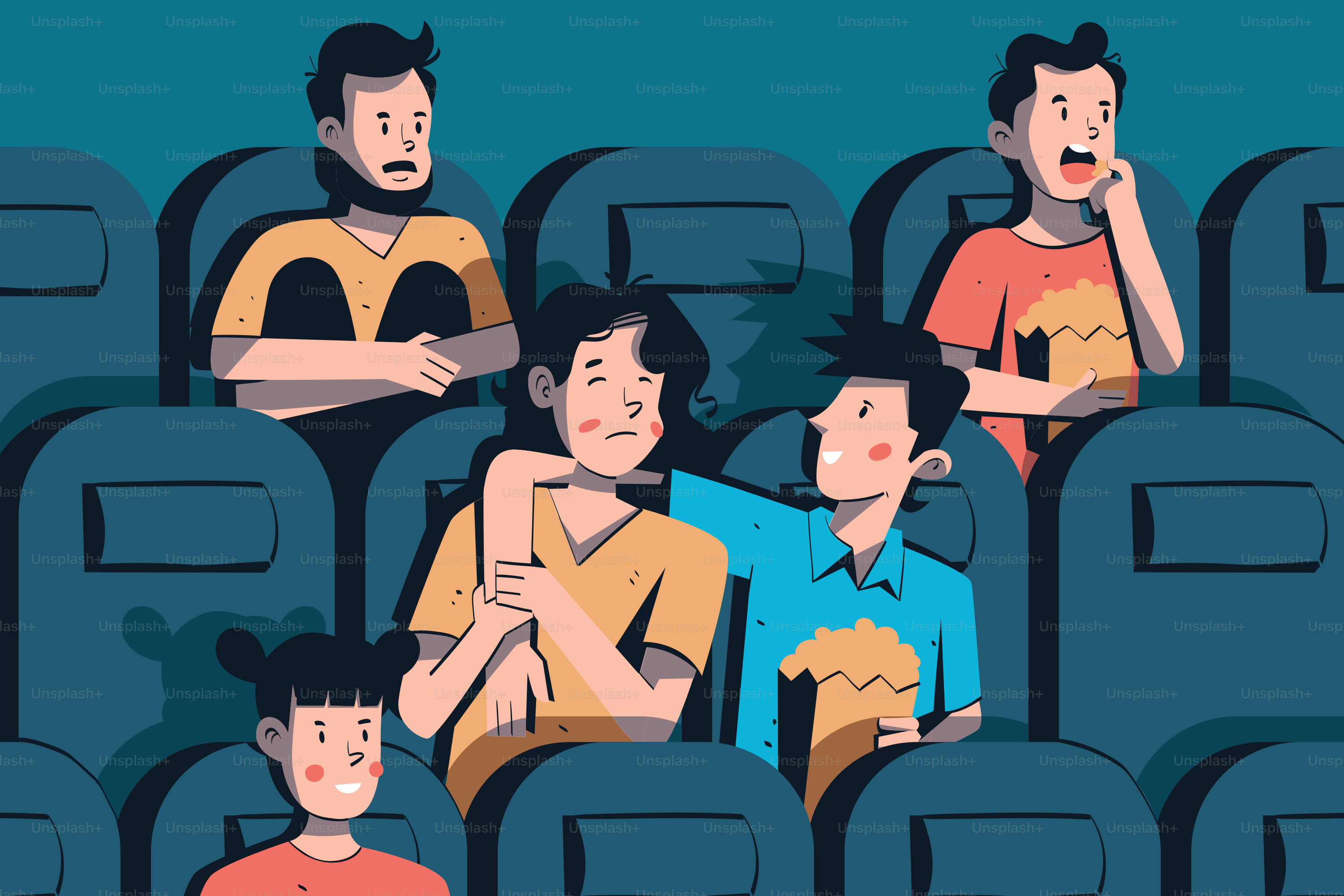A group of people sitting in a movie theater