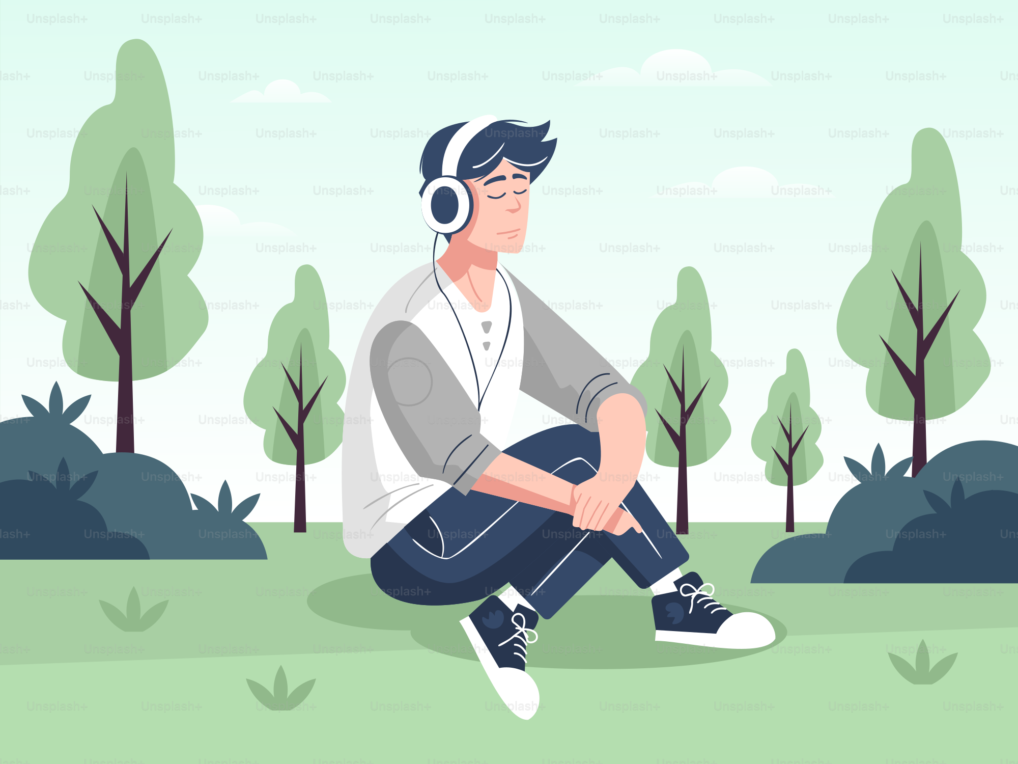 A man sitting on the ground with headphones on