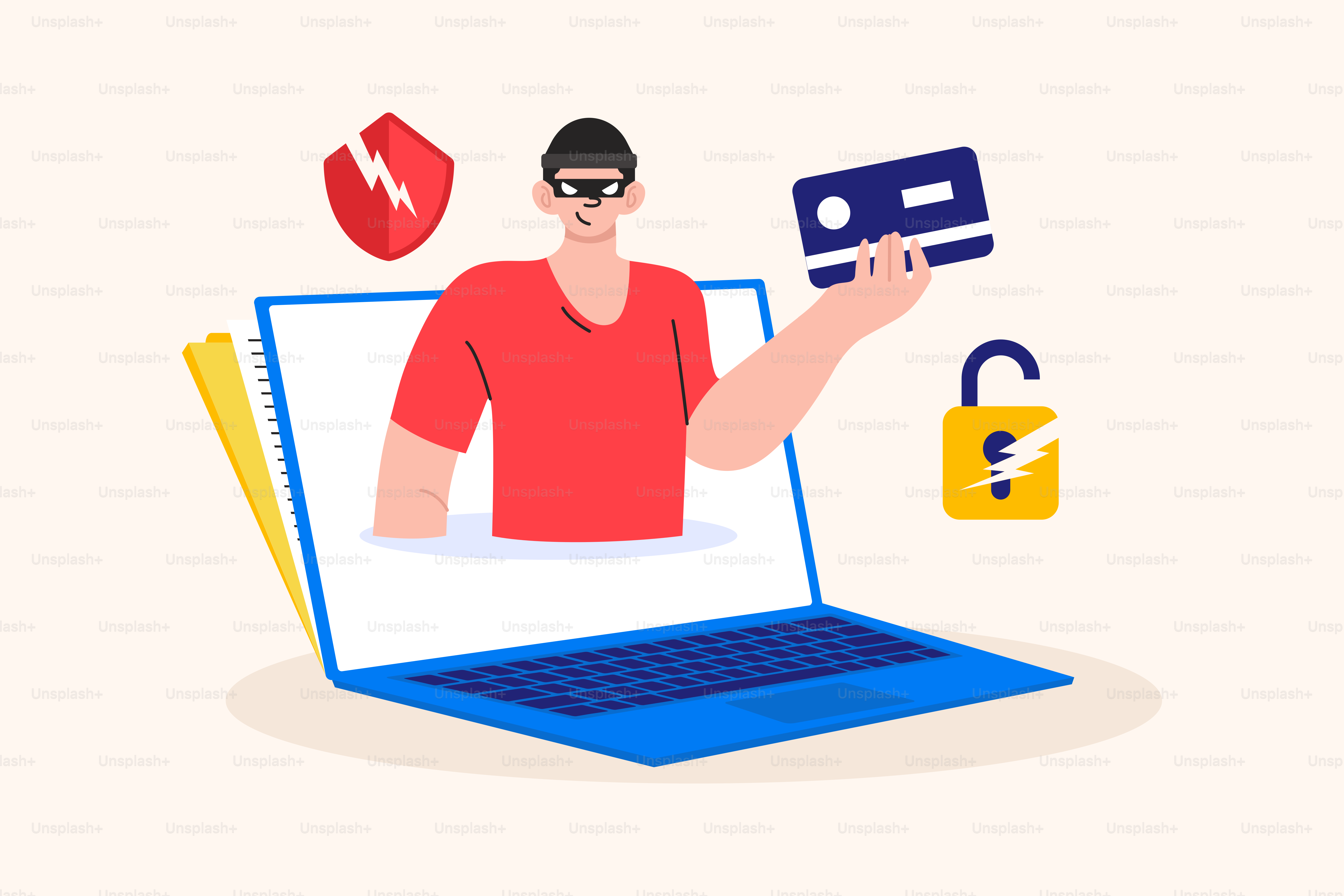 Un homme tenant une carte de crédit devant un ordinateur portable