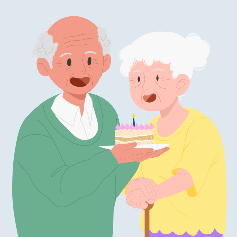 An elderly couple holding a cake with a candle on it