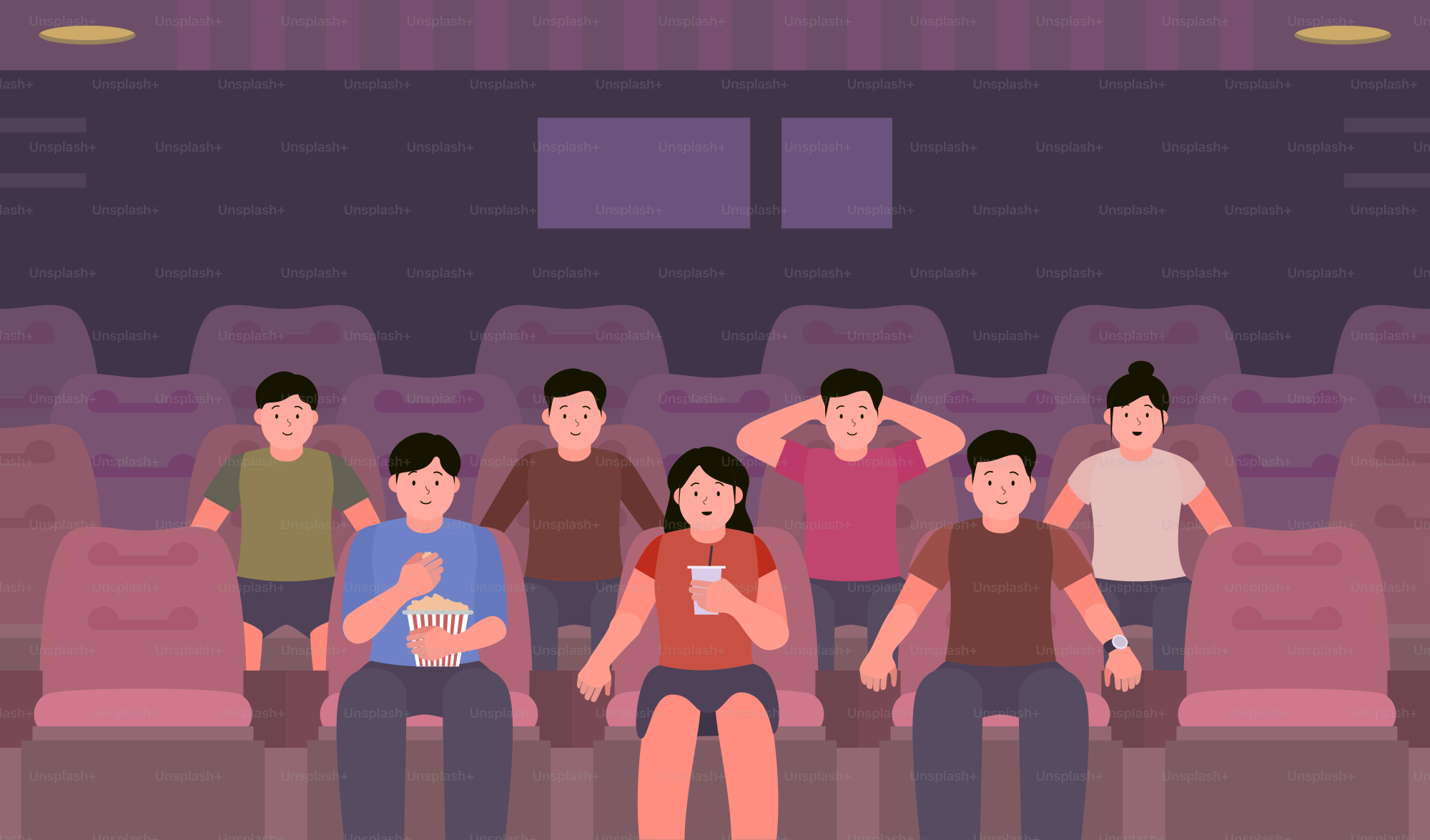 극장에 앉아있는 한 무리의 사람들