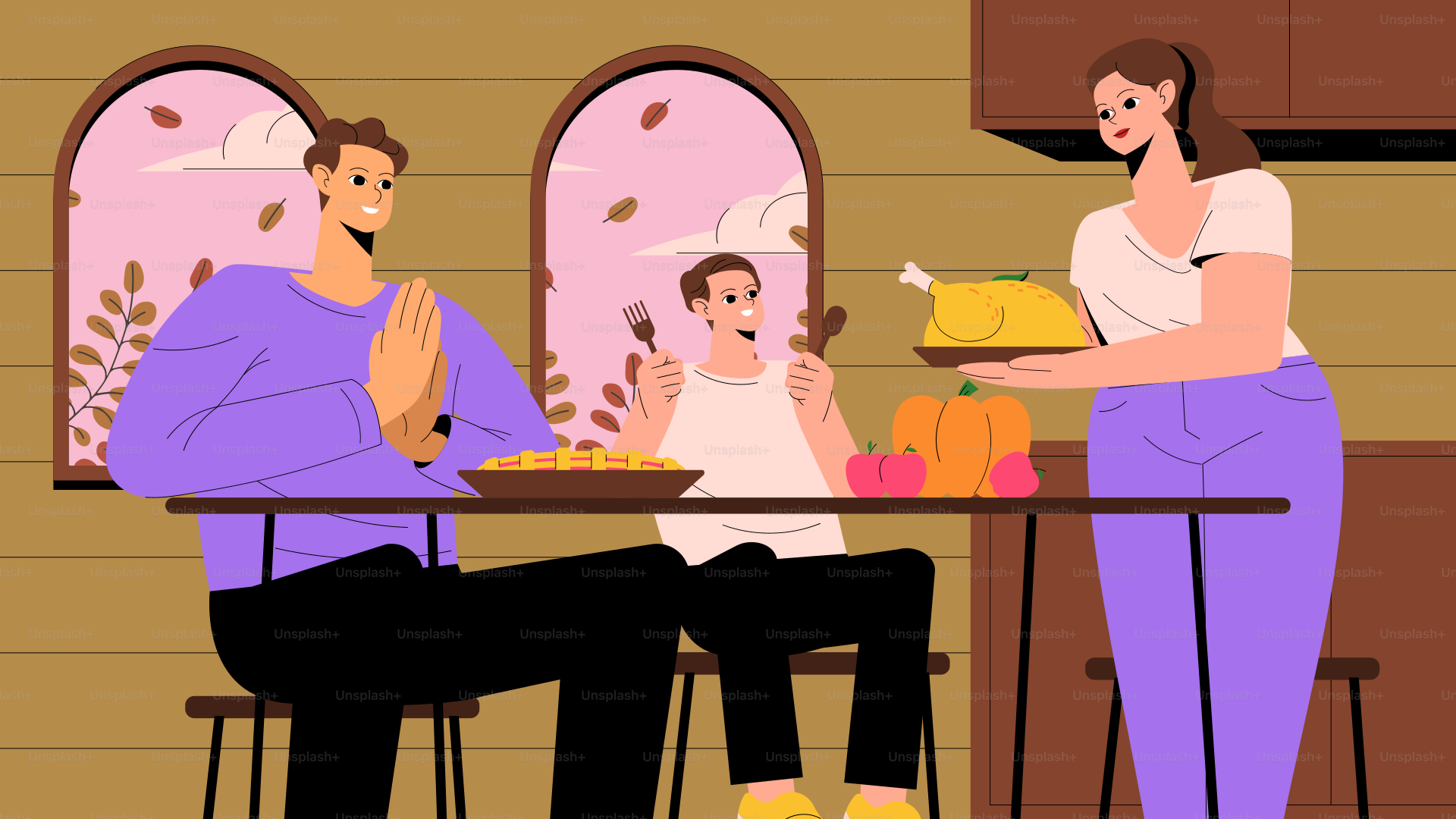 A man and woman sitting at a table with a child