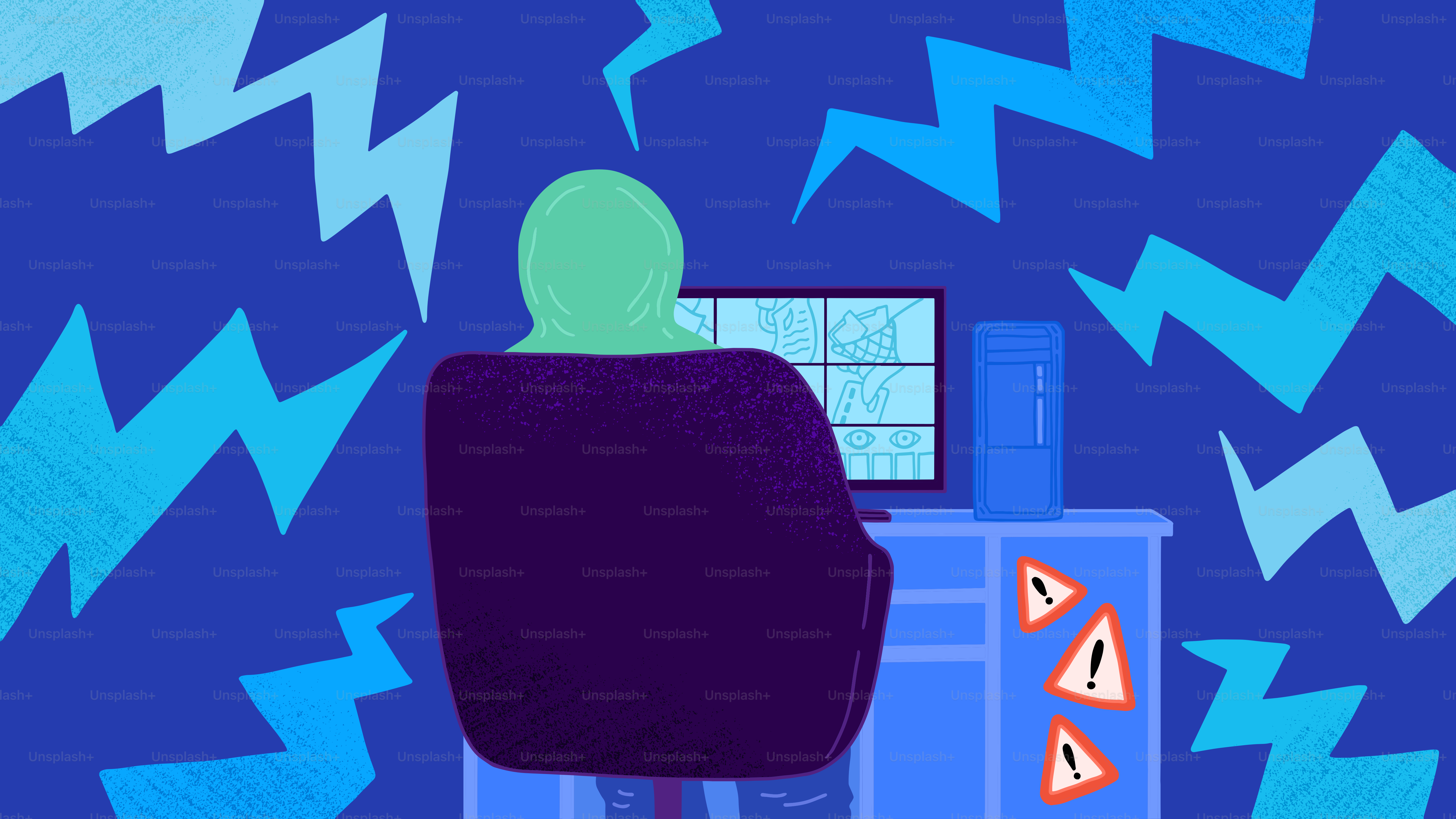 Una persona seduta a una scrivania con un computer