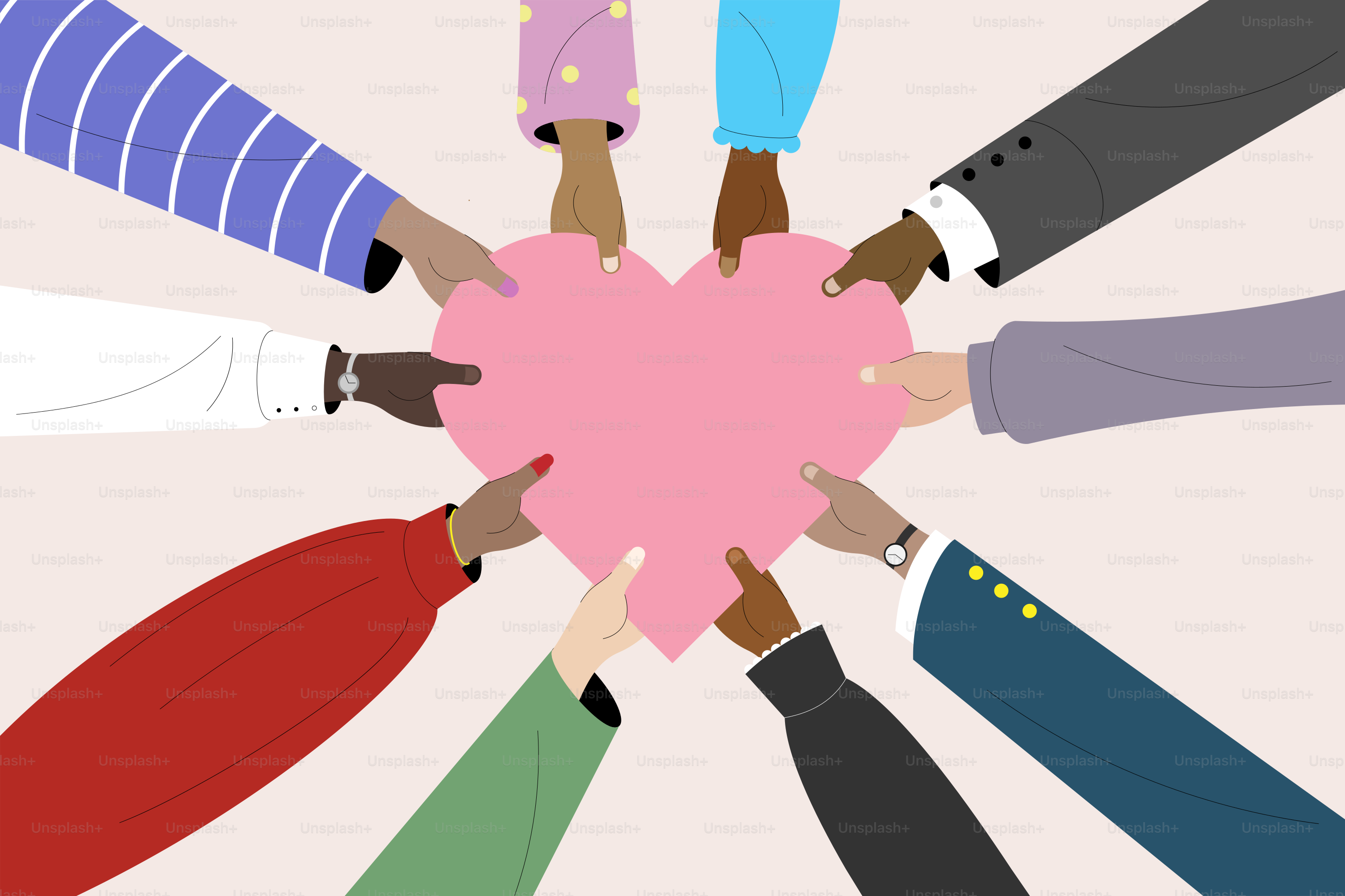 A group of people holding a pink heart