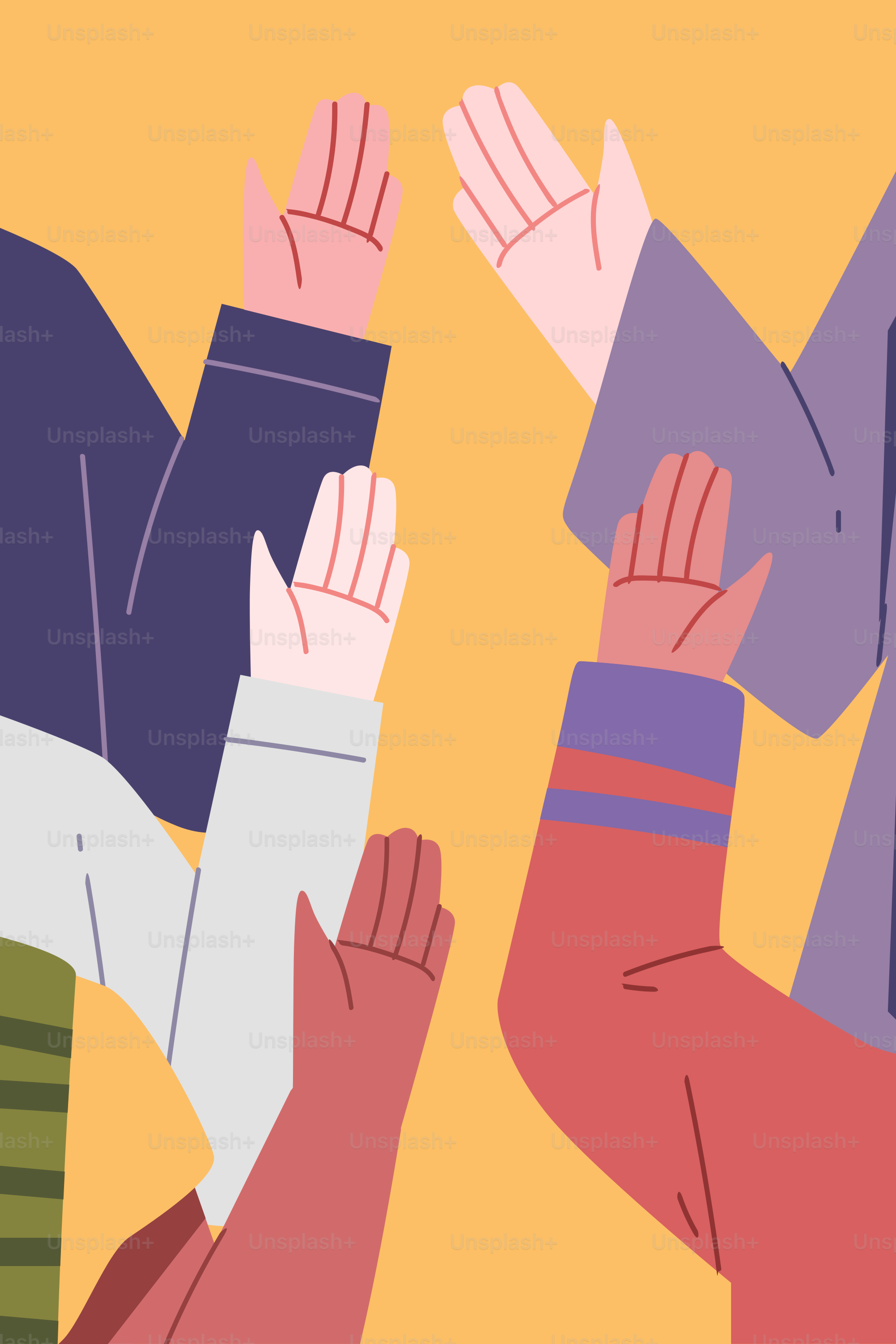 A group of people raising their hands in the air