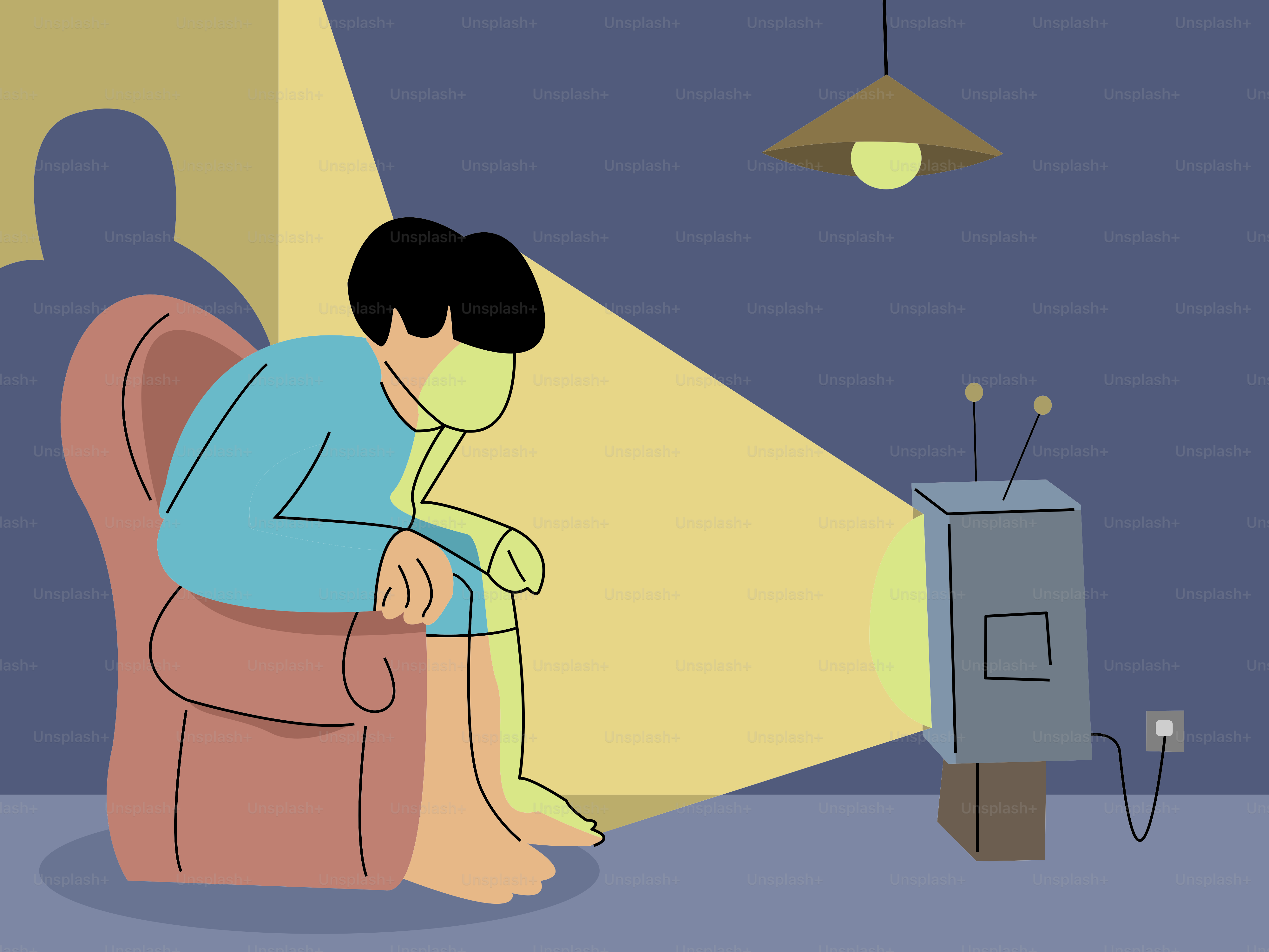 A man sitting in a chair in front of a TV