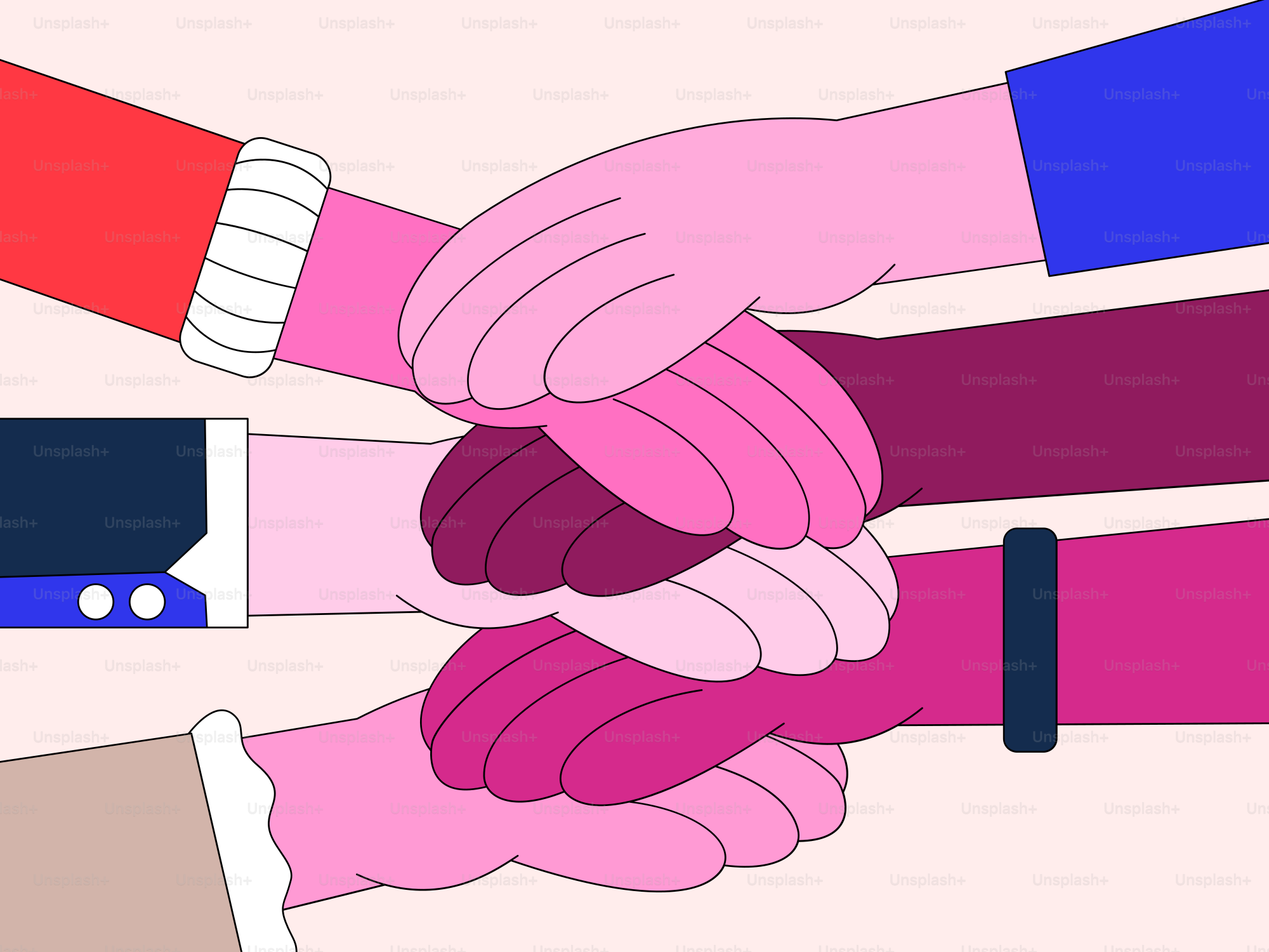 A group of people holding hands in a circle