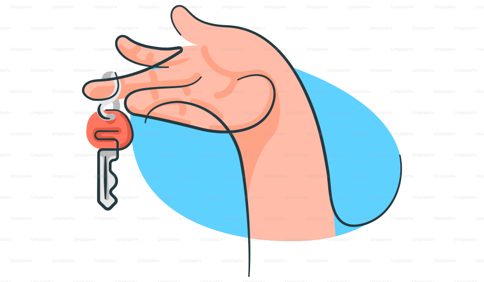 A hand holding a key to a house