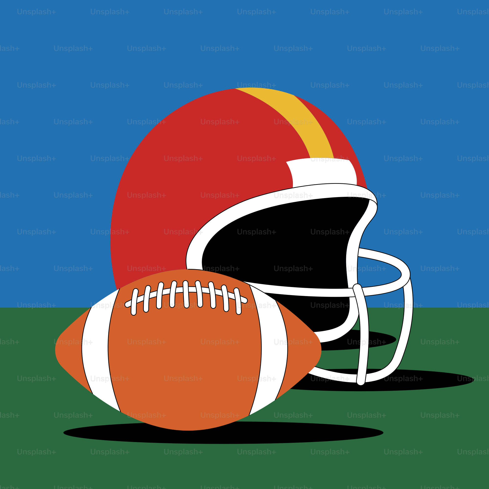 A football and a helmet on a field