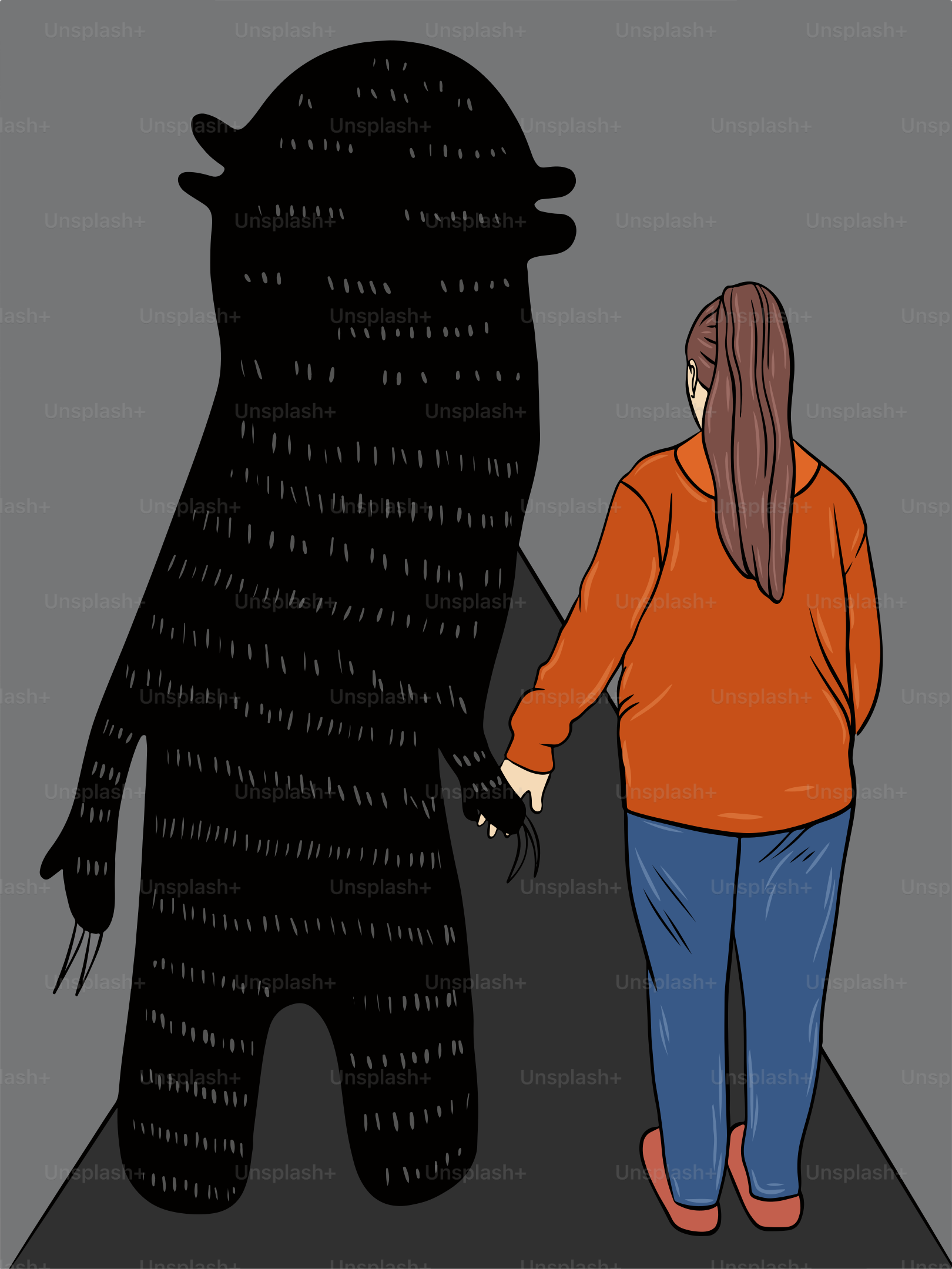 A woman standing next to a giant black bear