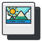 A computer screen with a picture of mountains on it