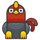 Un oiseau rouge et noir au bec jaune