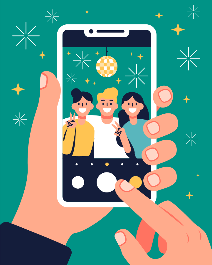 A hand holding a smart phone taking a picture of a group of people