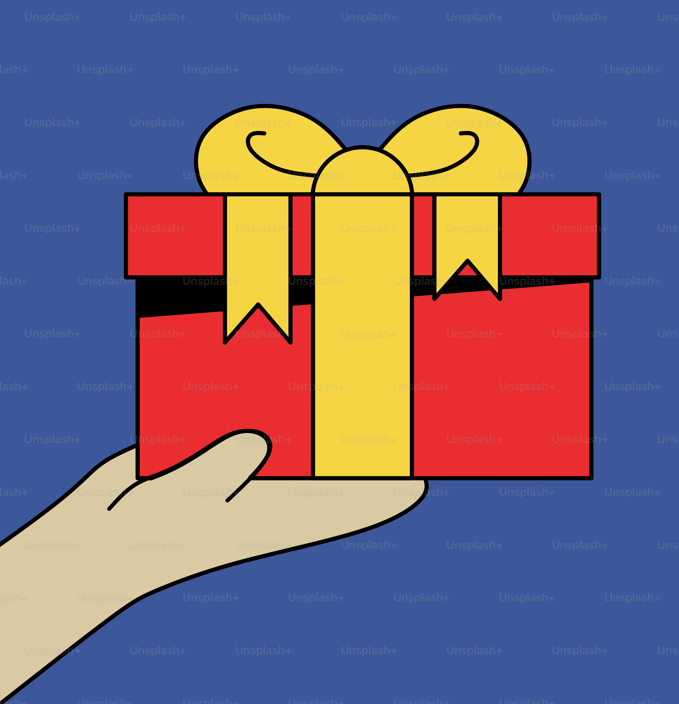 A hand holding a red and yellow gift box