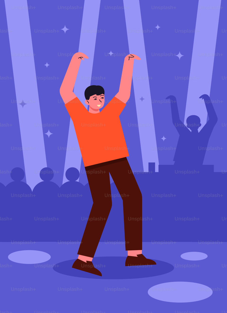 A man standing on a stage with his arms in the air