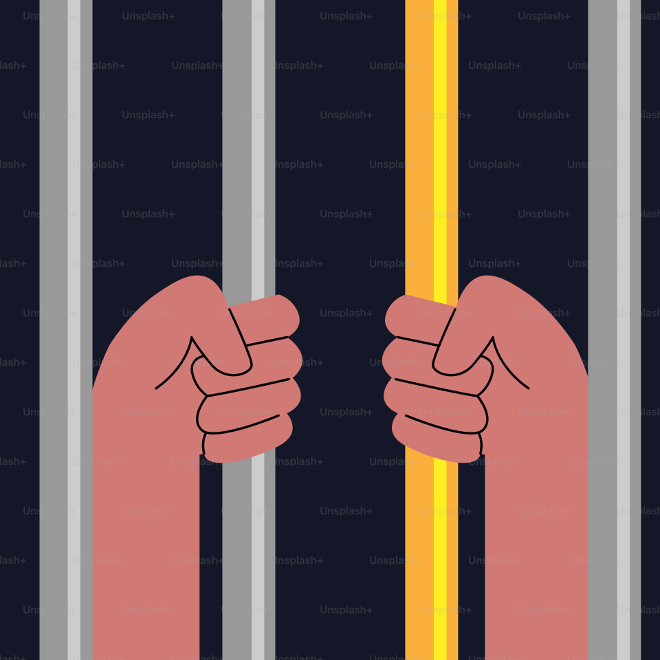 Une main tenant une barre jaune dans une cellule de prison