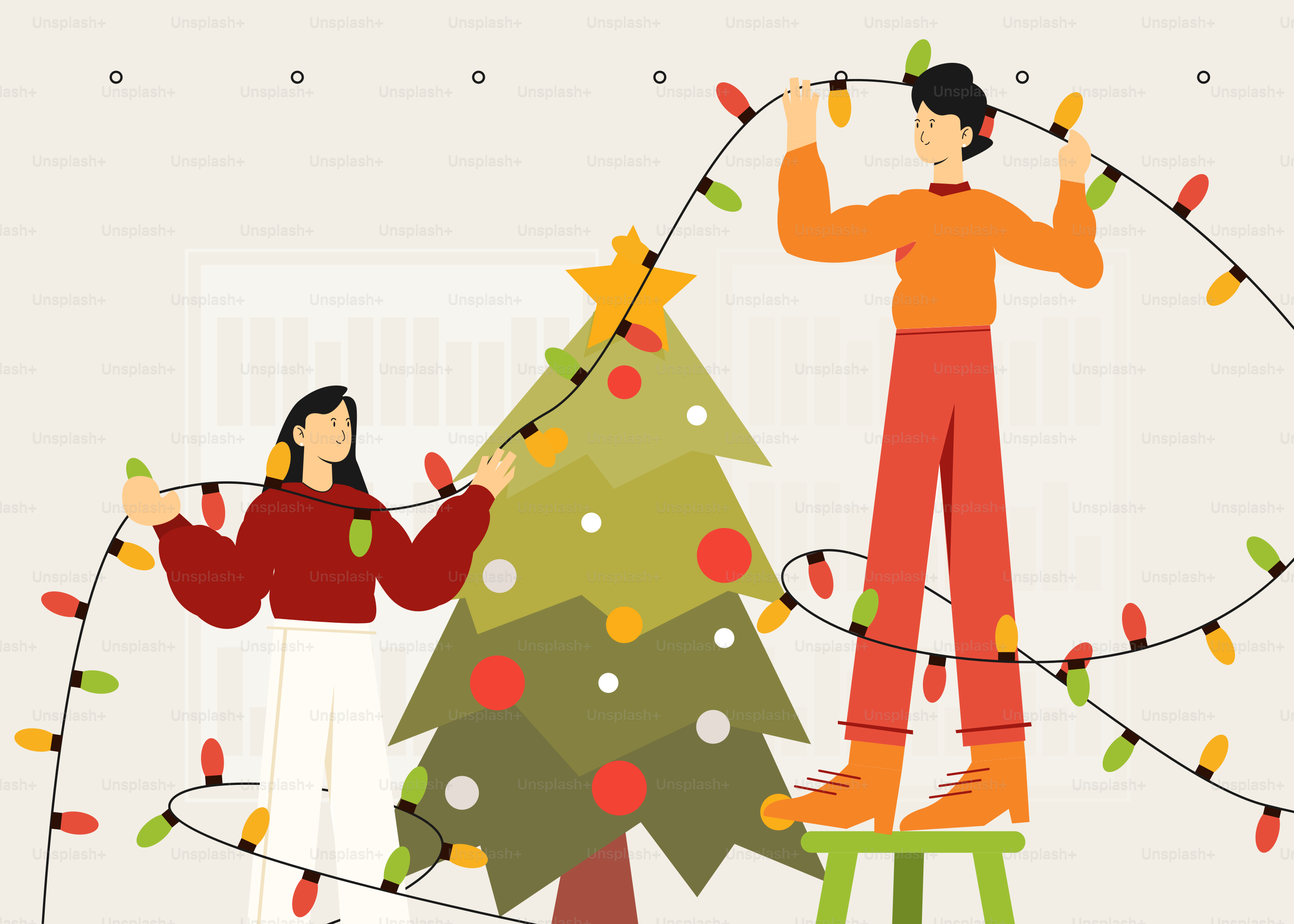 クリスマスツリーを飾る男女