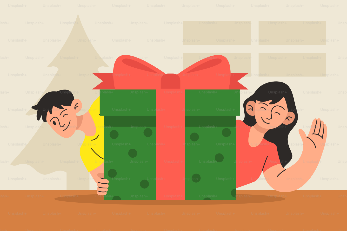 A man and a woman sitting next to a christmas present