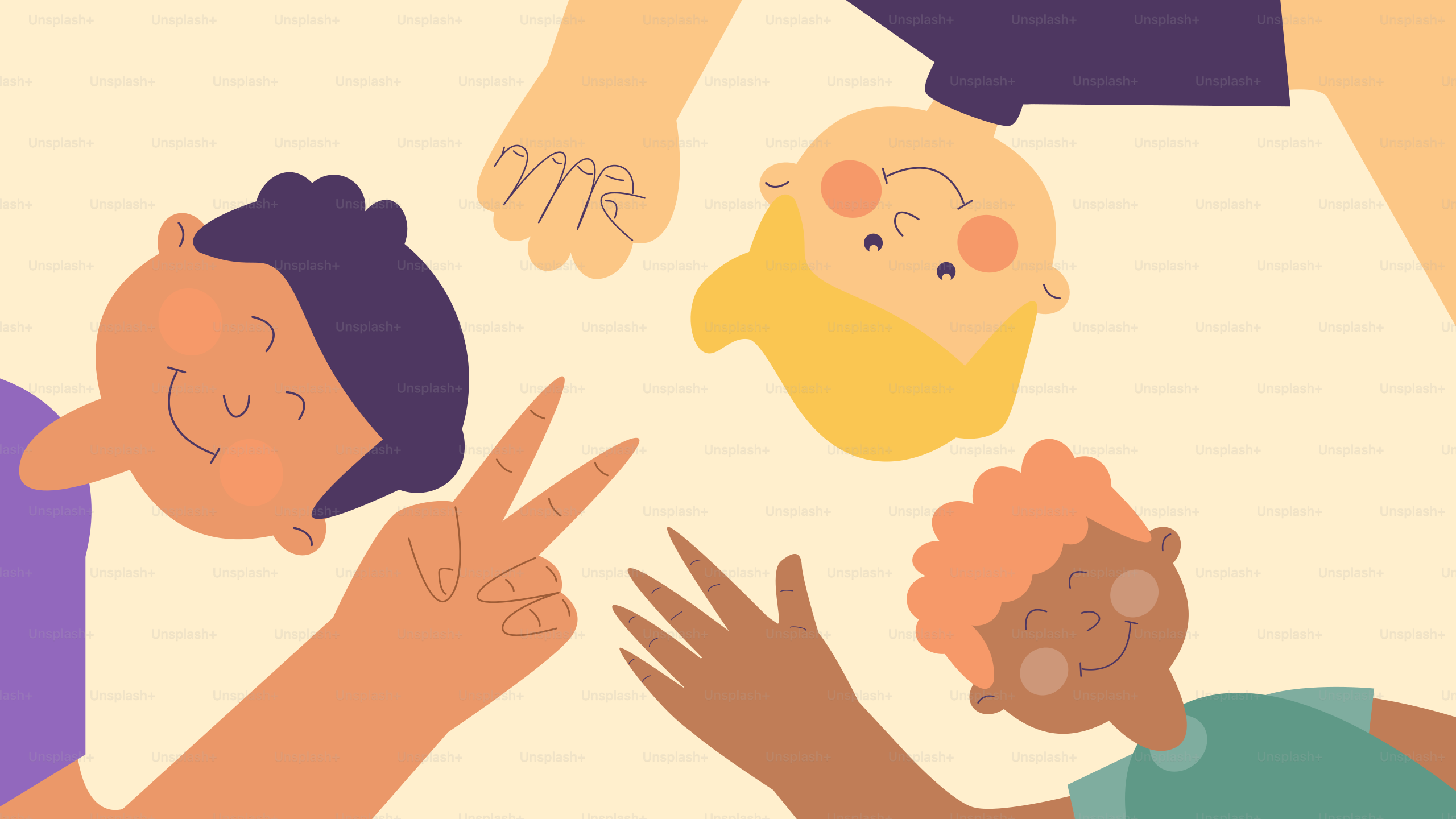 A group of people holding their hands together