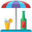 A picture of a bottle and a glass under an umbrella