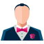 A man in a tuxedo with a pink bow tie