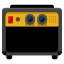 A yellow and black radio sitting on top of a table