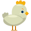A white chicken with a yellow crown on its head