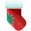 A red christmas stocking with a green decoration