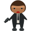 Un homme en costume avec une arme à la main