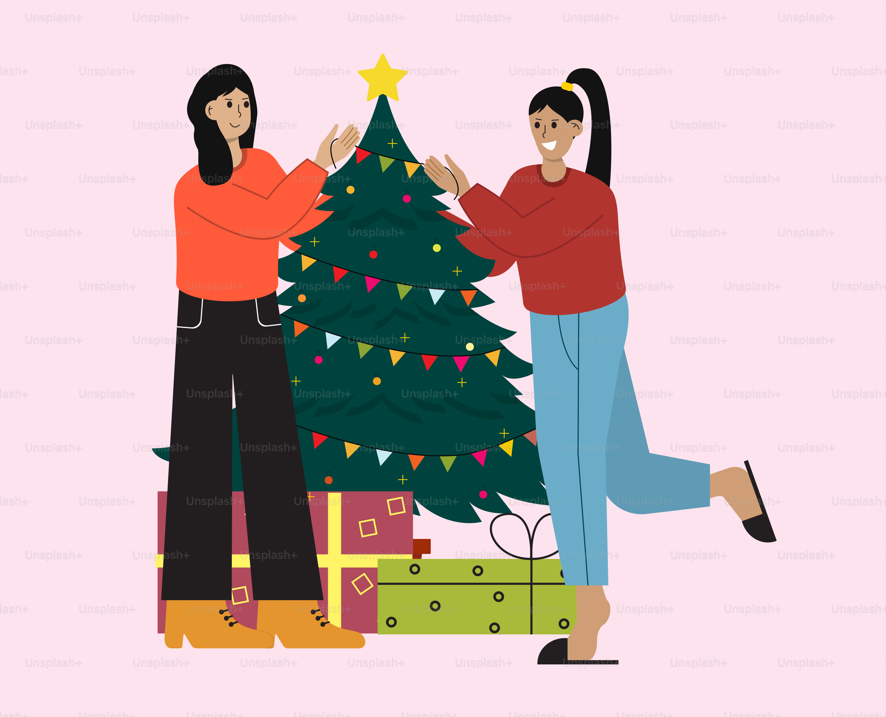 A couple of women standing next to a christmas tree