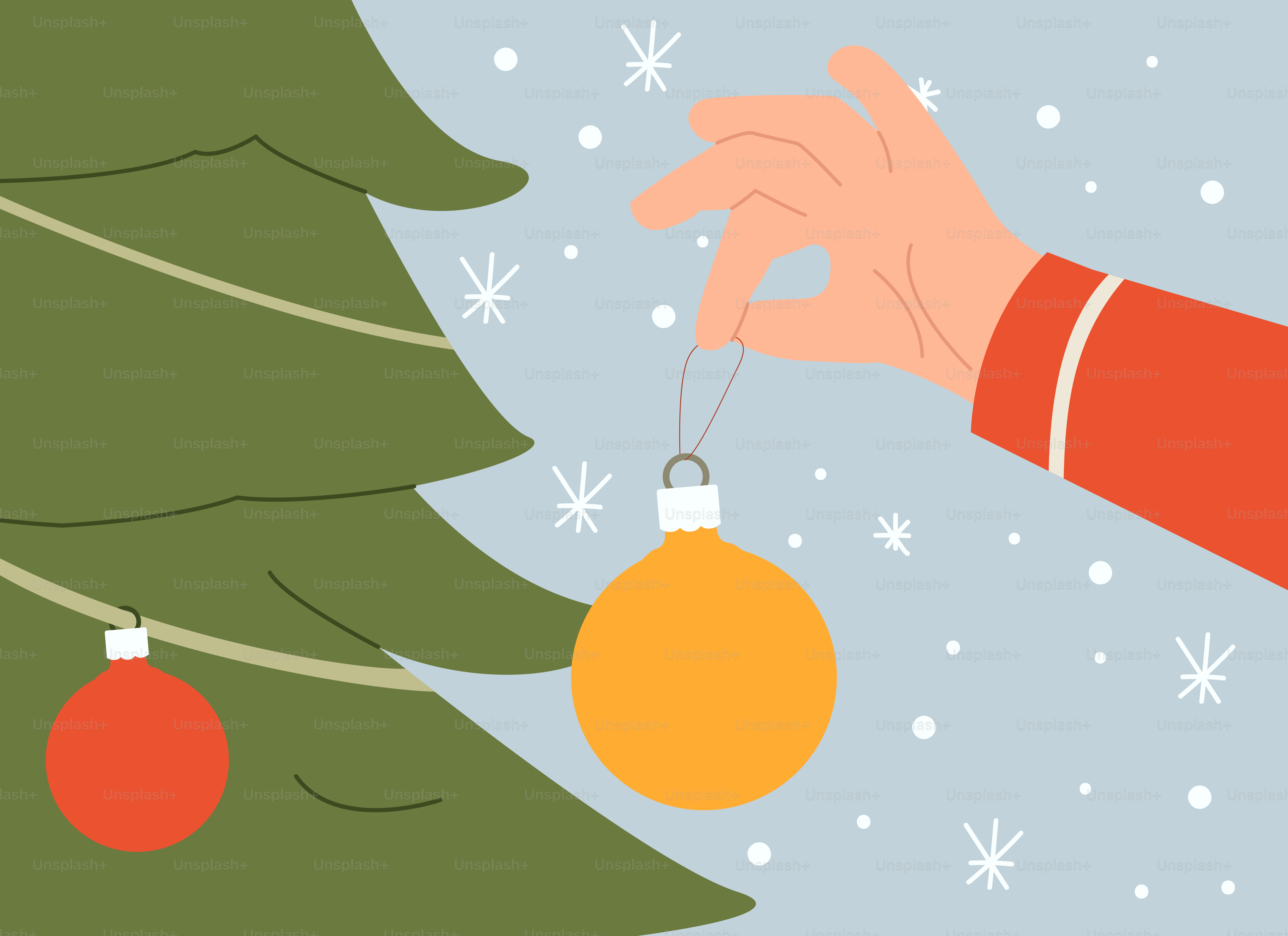 A person holding a christmas ornament in front of a christmas tree