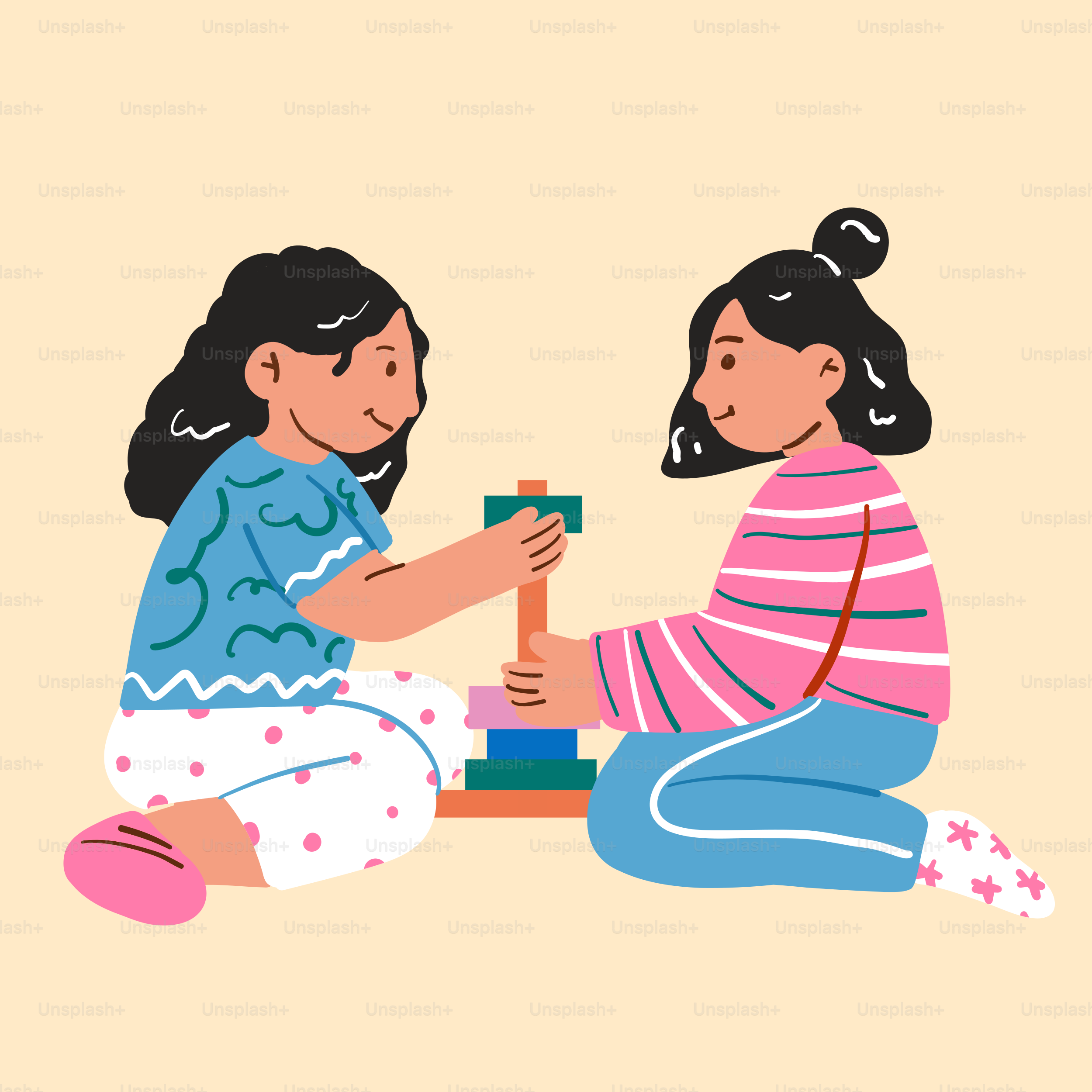 床でおもちゃで遊ぶ二人の小さな女の子