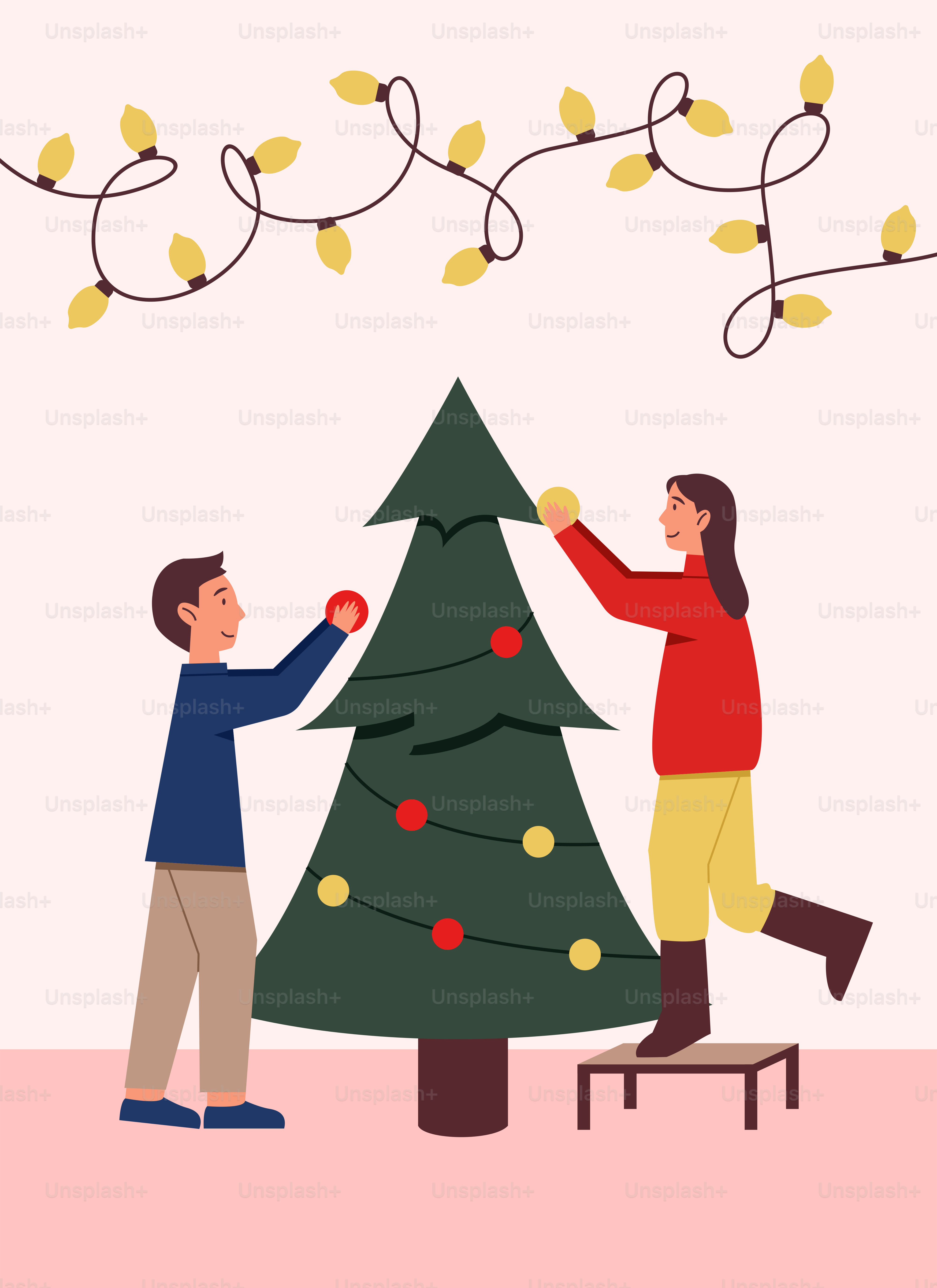 Un uomo e una donna che decorano un albero di Natale