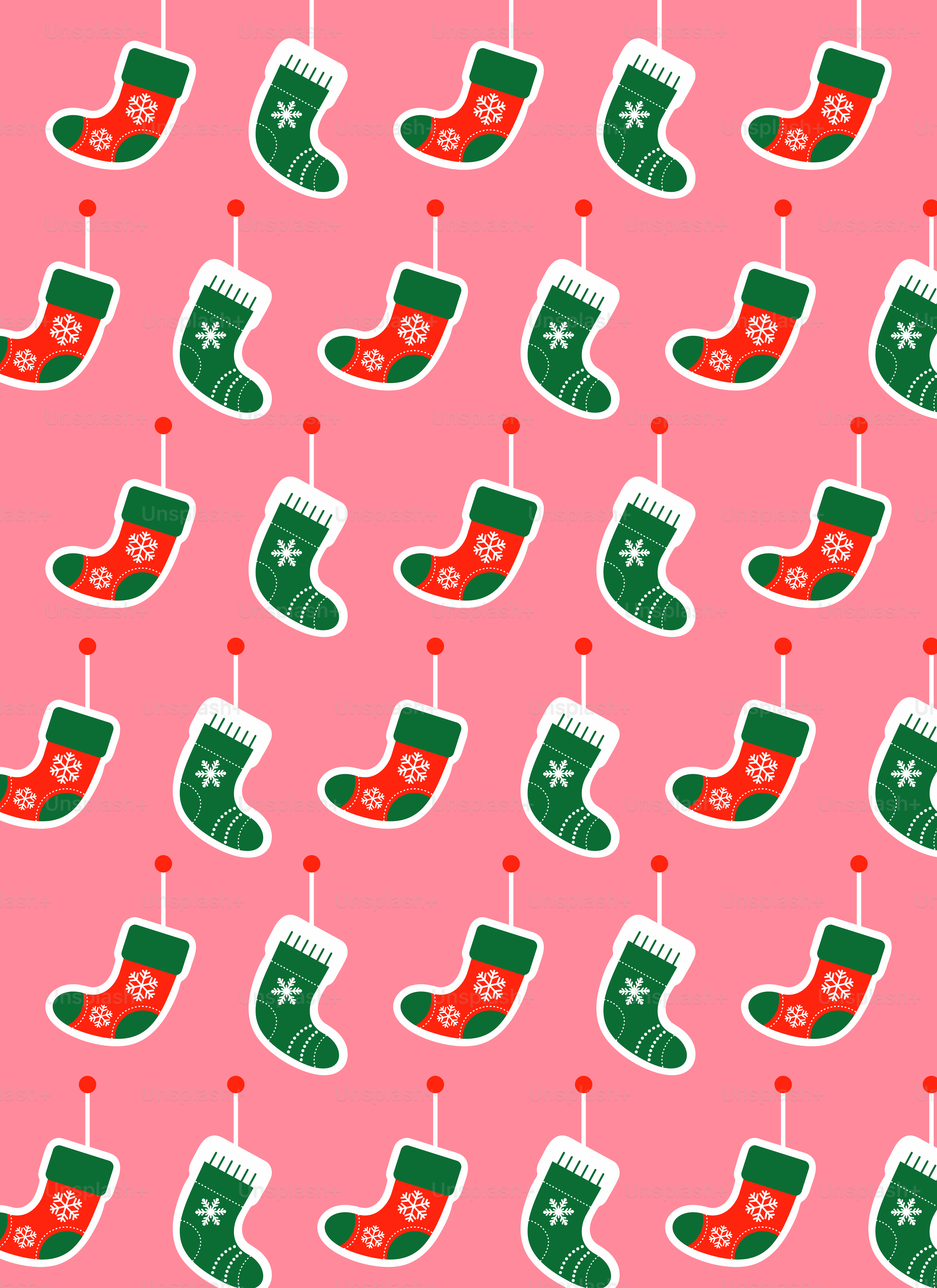 A pink background with green and white christmas stockings