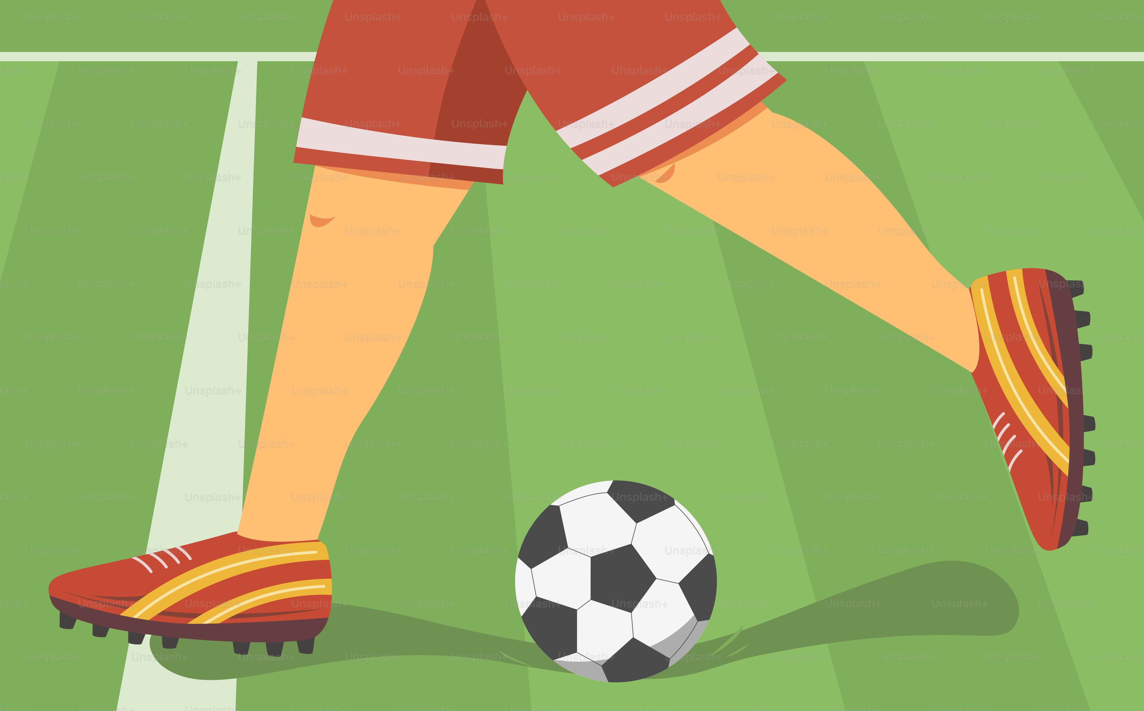 フィールドでサッカーボールを蹴る人