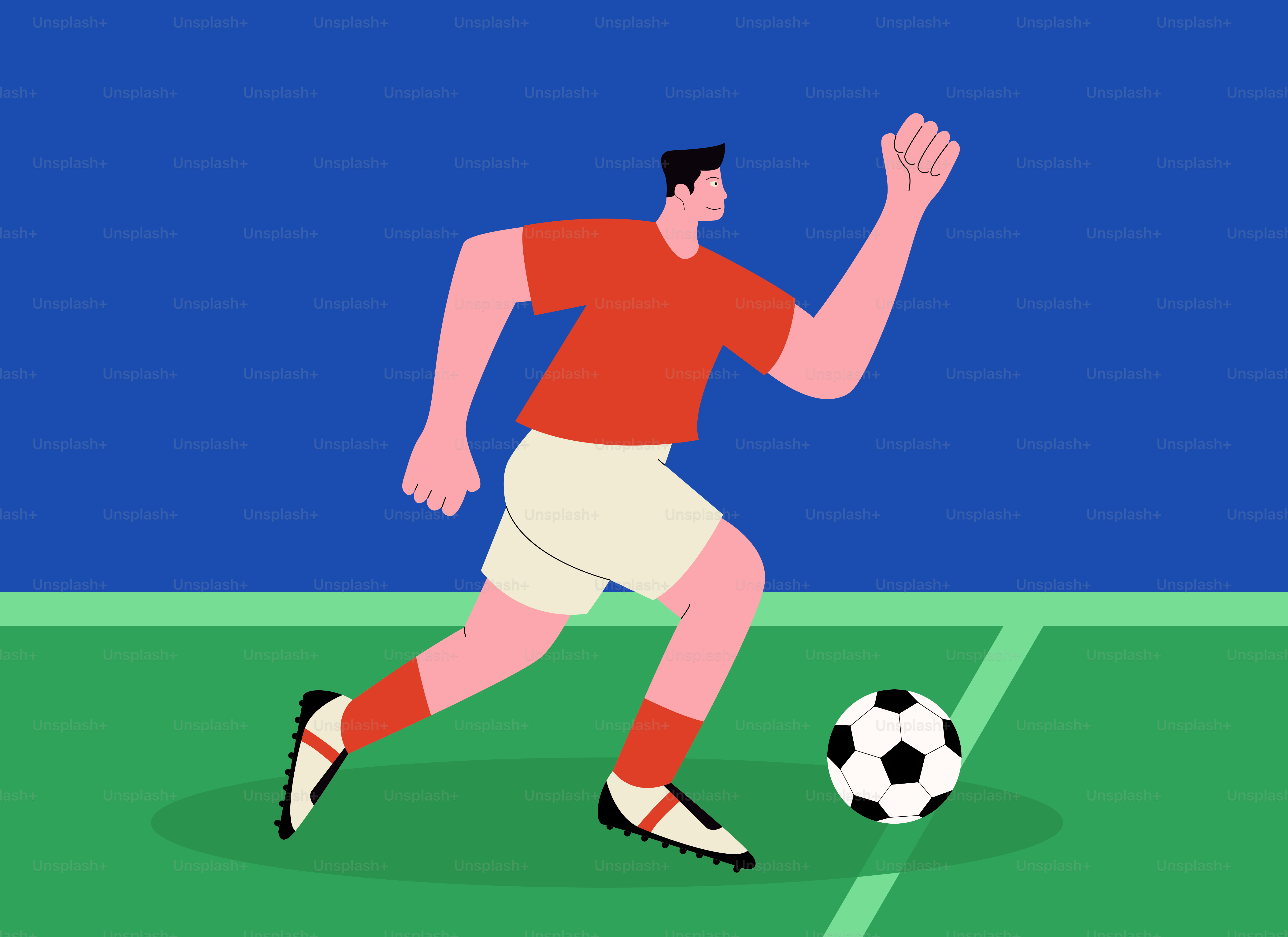 A man in a red shirt is kicking a soccer ball