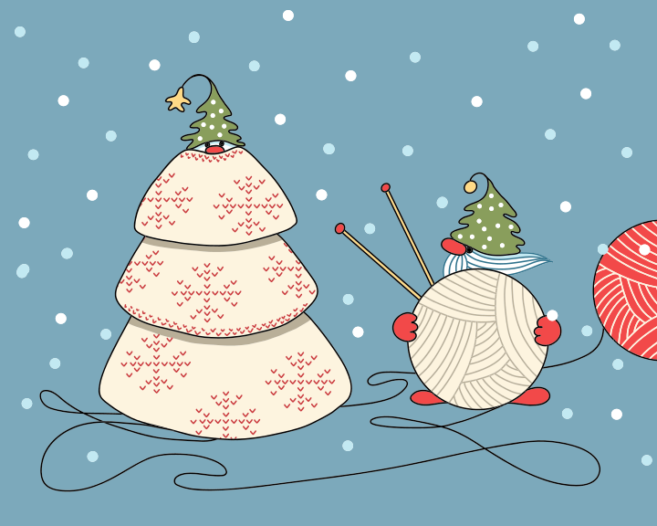 A couple of balls of yarn next to a christmas tree