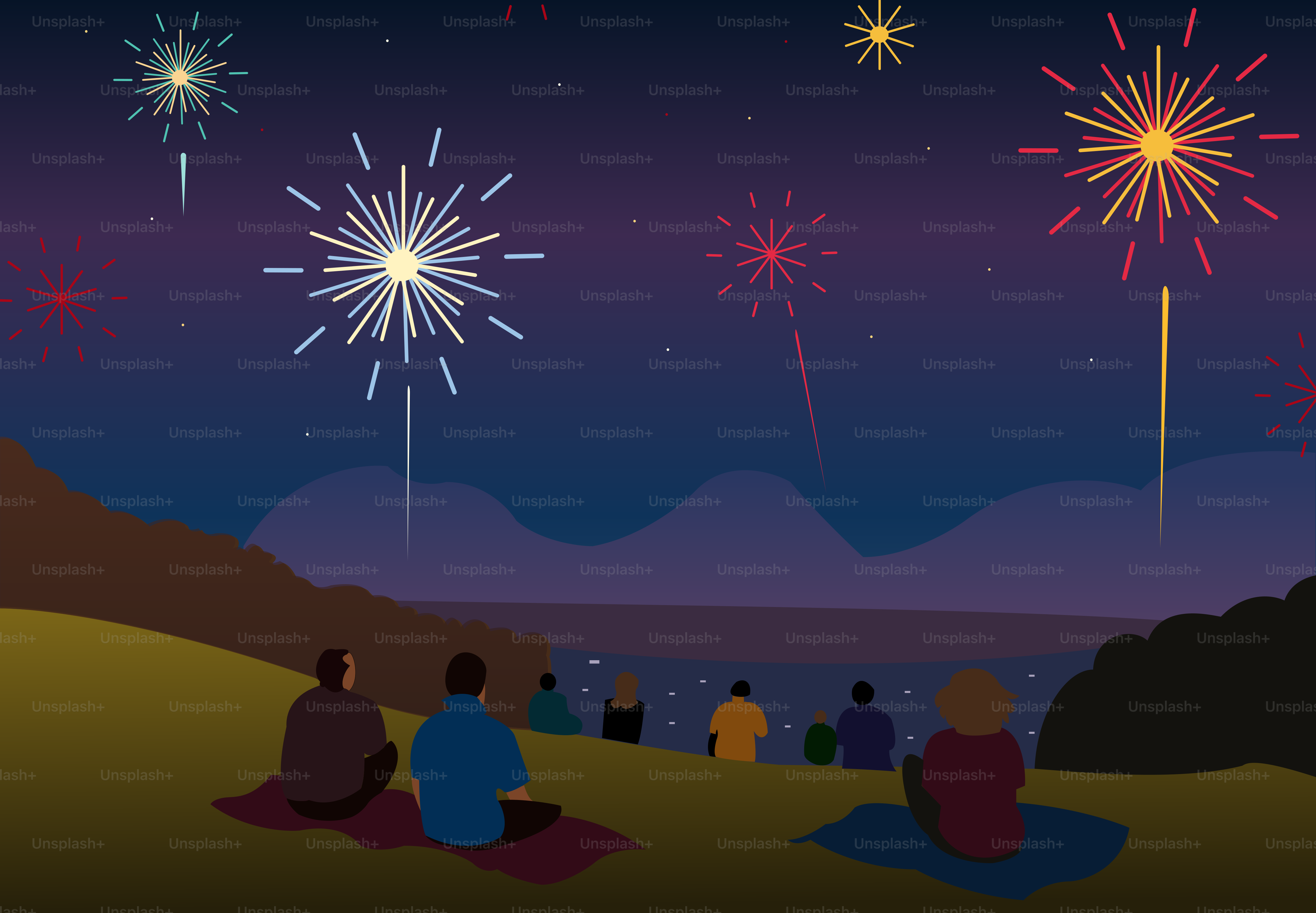 A group of people sitting on top of a hill watching fireworks